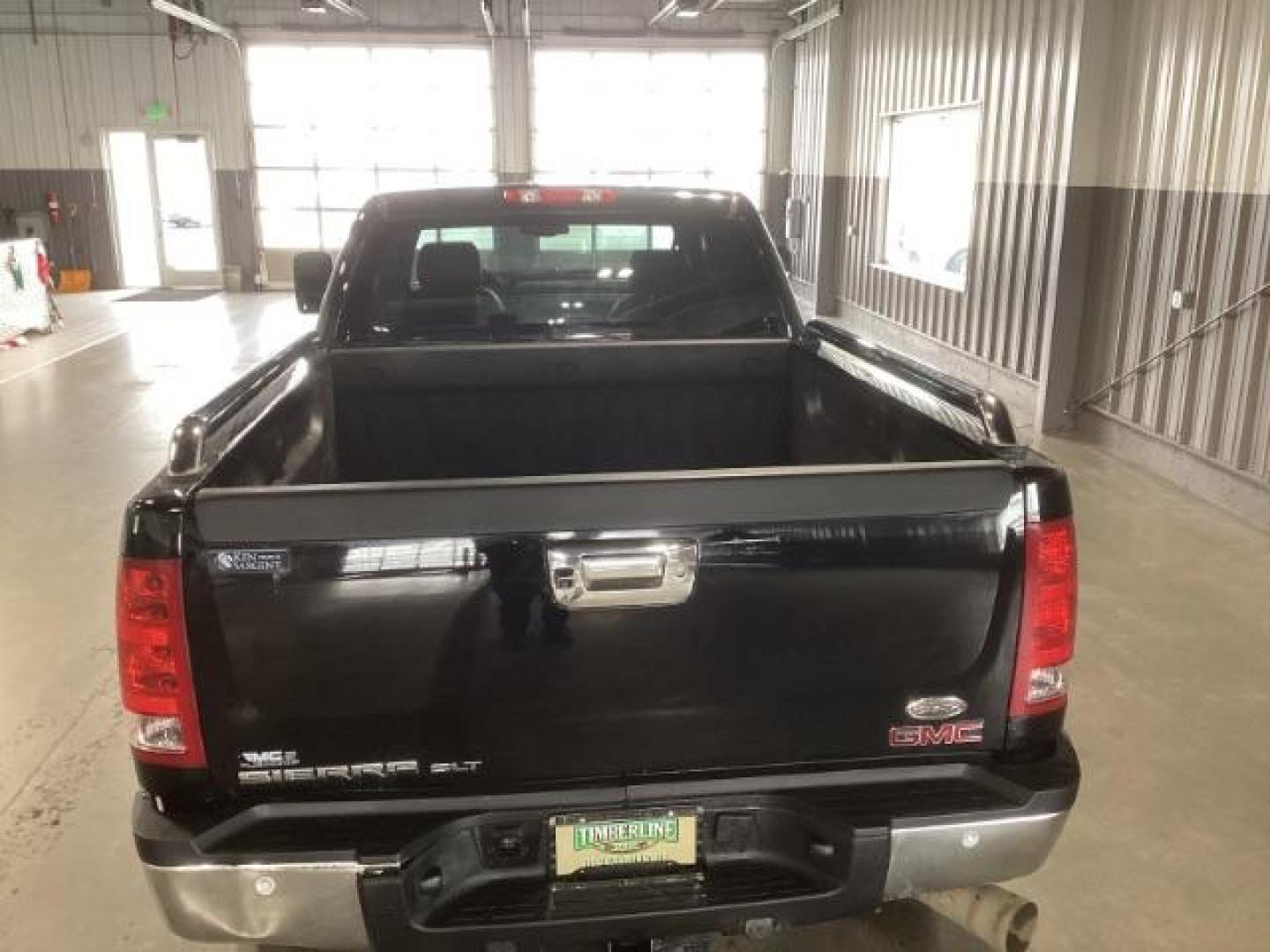 2013 Onyx Black /Ebony Leather Interior GMC Sierra 2500HD SLT Crew Cab 4WD (1GT121E86DF) with an 6.6L V8 OHV 32V TURBO DIESEL engine, 6-Speed Automatic transmission, located at 1235 N Woodruff Ave., Idaho Falls, 83401, (208) 523-1053, 43.507172, -112.000488 - At Timberline Auto, finding a great deal on your next vehicle is always easy! Our experienced sales staff's goal is to help find you the right vehicle at the right price! Our knowledgeable finance department has options for almost any credit score. We offer extended service contract options to prote - Photo#3