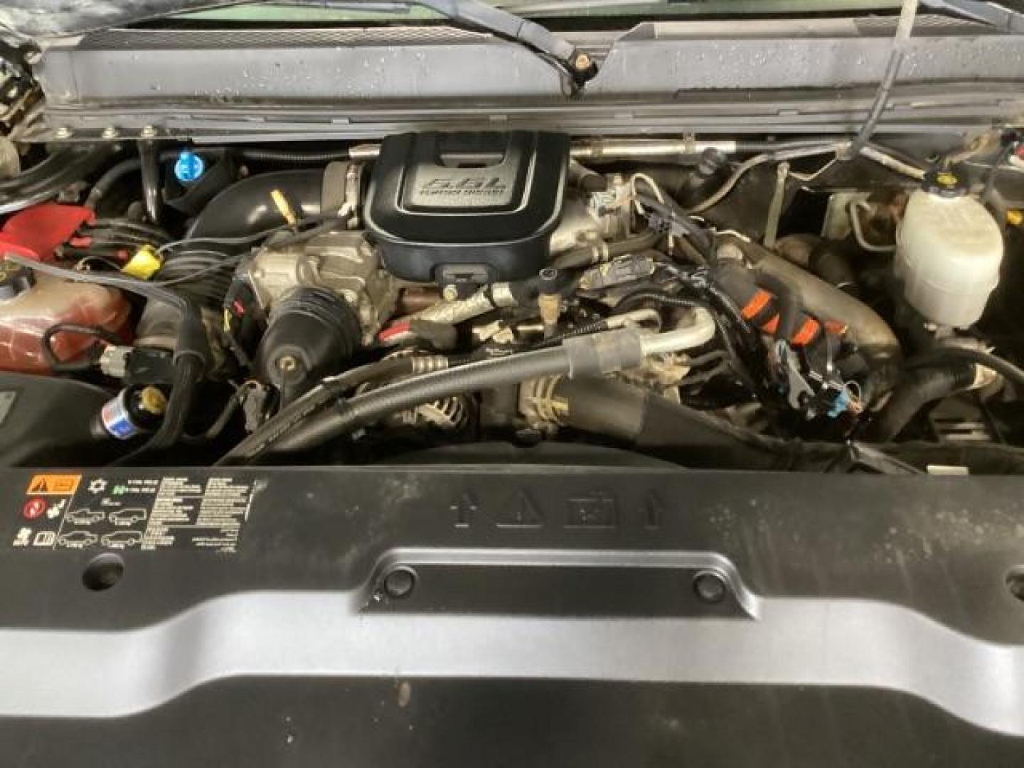2013 Onyx Black /Ebony Leather Interior GMC Sierra 2500HD SLT Crew Cab 4WD (1GT121E86DF) with an 6.6L V8 OHV 32V TURBO DIESEL engine, 6-Speed Automatic transmission, located at 1235 N Woodruff Ave., Idaho Falls, 83401, (208) 523-1053, 43.507172, -112.000488 - At Timberline Auto, finding a great deal on your next vehicle is always easy! Our experienced sales staff's goal is to help find you the right vehicle at the right price! Our knowledgeable finance department has options for almost any credit score. We offer extended service contract options to prote - Photo#6