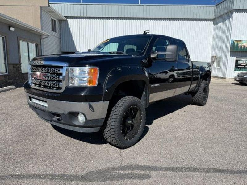 2013 Steel Gray Metallic /Ebony GMC Sierra SLT (1GT121E86DF) with an V8, 6.6L engine, 6-Speed Automatic transmission, located at 1175 N Woodruff Ave, Idaho Falls, ID, 83401, 43.506901, -111.999657 - <b>Vehicle Details</b><br>Looking for a heavy-duty pickup that blends power, comfort, and capability? This pre-owned 2013 GMC Sierra 2500 SLT with 4WD and a V8 6.6L Diesel engine is ready to tackle tough jobs and weekend adventures alike. Built for drivers who need serious towing strength and confid- Photo#0