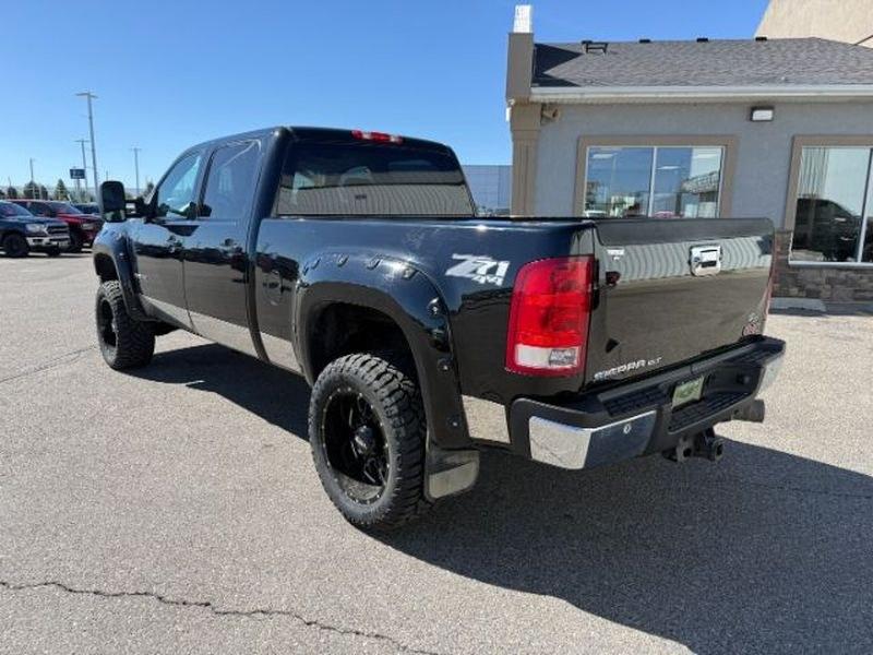 2013 Steel Gray Metallic /Ebony GMC Sierra SLT (1GT121E86DF) with an V8, 6.6L engine, 6-Speed Automatic transmission, located at 1175 N Woodruff Ave, Idaho Falls, ID, 83401, 43.506901, -111.999657 - <b>Vehicle Details</b><br>Looking for a heavy-duty pickup that blends power, comfort, and capability? This pre-owned 2013 GMC Sierra 2500 SLT with 4WD and a V8 6.6L Diesel engine is ready to tackle tough jobs and weekend adventures alike. Built for drivers who need serious towing strength and confid- Photo#2