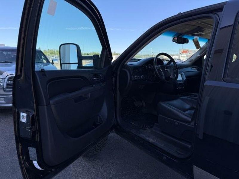 2013 Steel Gray Metallic /Ebony GMC Sierra SLT (1GT121E86DF) with an V8, 6.6L engine, 6-Speed Automatic transmission, located at 1175 N Woodruff Ave, Idaho Falls, ID, 83401, 43.506901, -111.999657 - <b>Vehicle Details</b><br>Looking for a heavy-duty pickup that blends power, comfort, and capability? This pre-owned 2013 GMC Sierra 2500 SLT with 4WD and a V8 6.6L Diesel engine is ready to tackle tough jobs and weekend adventures alike. Built for drivers who need serious towing strength and confid- Photo#12