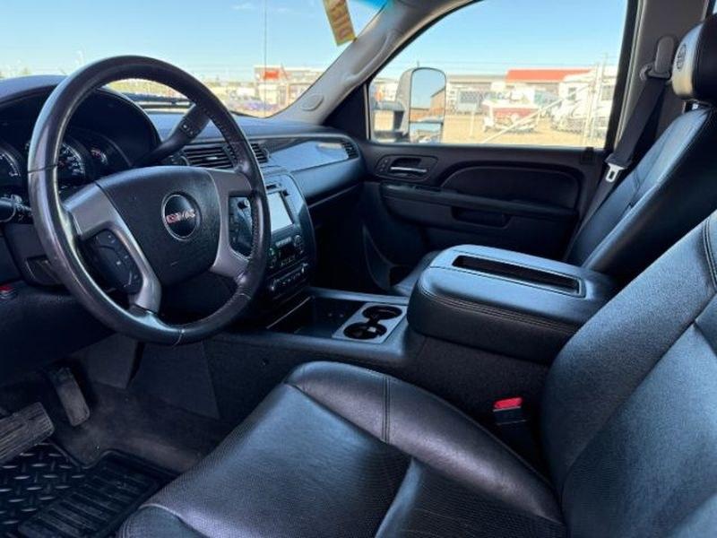 2013 Steel Gray Metallic /Ebony GMC Sierra SLT (1GT121E86DF) with an V8, 6.6L engine, 6-Speed Automatic transmission, located at 1175 N Woodruff Ave, Idaho Falls, ID, 83401, 43.506901, -111.999657 - <b>Vehicle Details</b><br>Looking for a heavy-duty pickup that blends power, comfort, and capability? This pre-owned 2013 GMC Sierra 2500 SLT with 4WD and a V8 6.6L Diesel engine is ready to tackle tough jobs and weekend adventures alike. Built for drivers who need serious towing strength and confid- Photo#14