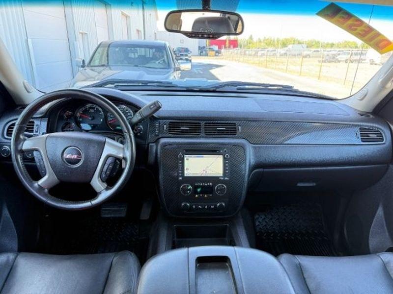 2013 Steel Gray Metallic /Ebony GMC Sierra SLT (1GT121E86DF) with an V8, 6.6L engine, 6-Speed Automatic transmission, located at 1175 N Woodruff Ave, Idaho Falls, ID, 83401, 43.506901, -111.999657 - <b>Vehicle Details</b><br>Looking for a heavy-duty pickup that blends power, comfort, and capability? This pre-owned 2013 GMC Sierra 2500 SLT with 4WD and a V8 6.6L Diesel engine is ready to tackle tough jobs and weekend adventures alike. Built for drivers who need serious towing strength and confid- Photo#24
