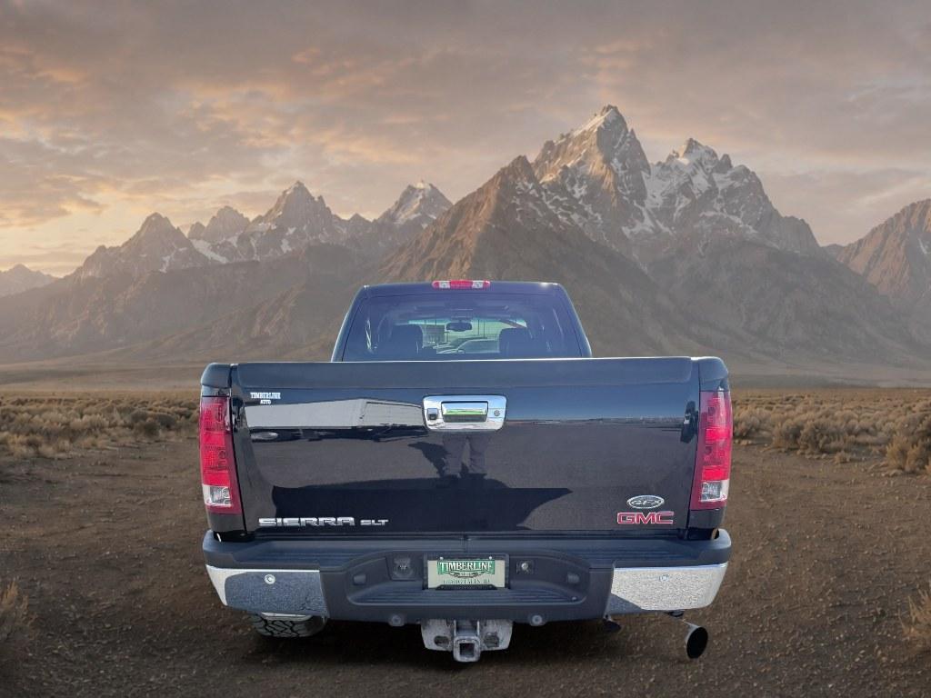 2013 Steel Gray Metallic /Ebony GMC Sierra SLT (1GT121E86DF) with an V8, 6.6L engine, 6-Speed Automatic transmission, located at 1175 N Woodruff Ave, Idaho Falls, ID, 83401, 43.506901, -111.999657 - <b>Vehicle Details</b><br>Looking for a heavy-duty pickup that blends power, comfort, and capability? This pre-owned 2013 GMC Sierra 2500 SLT with 4WD and a V8 6.6L Diesel engine is ready to tackle tough jobs and weekend adventures alike. Built for drivers who need serious towing strength and confid- Photo#2