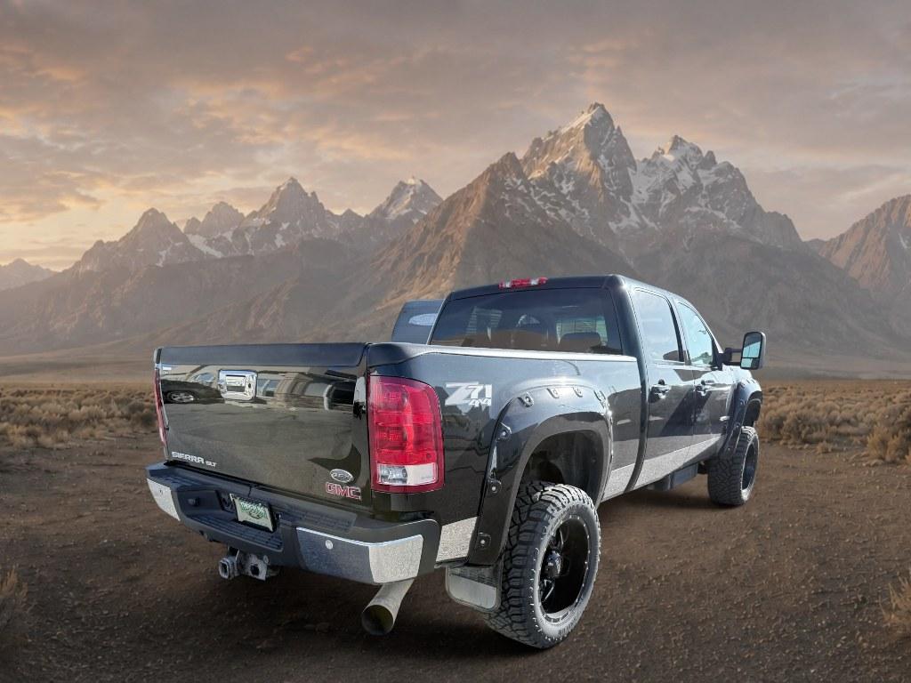 2013 Steel Gray Metallic /Ebony GMC Sierra SLT (1GT121E86DF) with an V8, 6.6L engine, 6-Speed Automatic transmission, located at 1175 N Woodruff Ave, Idaho Falls, ID, 83401, 43.506901, -111.999657 - <b>Vehicle Details</b><br>Looking for a heavy-duty pickup that blends power, comfort, and capability? This pre-owned 2013 GMC Sierra 2500 SLT with 4WD and a V8 6.6L Diesel engine is ready to tackle tough jobs and weekend adventures alike. Built for drivers who need serious towing strength and confid- Photo#3