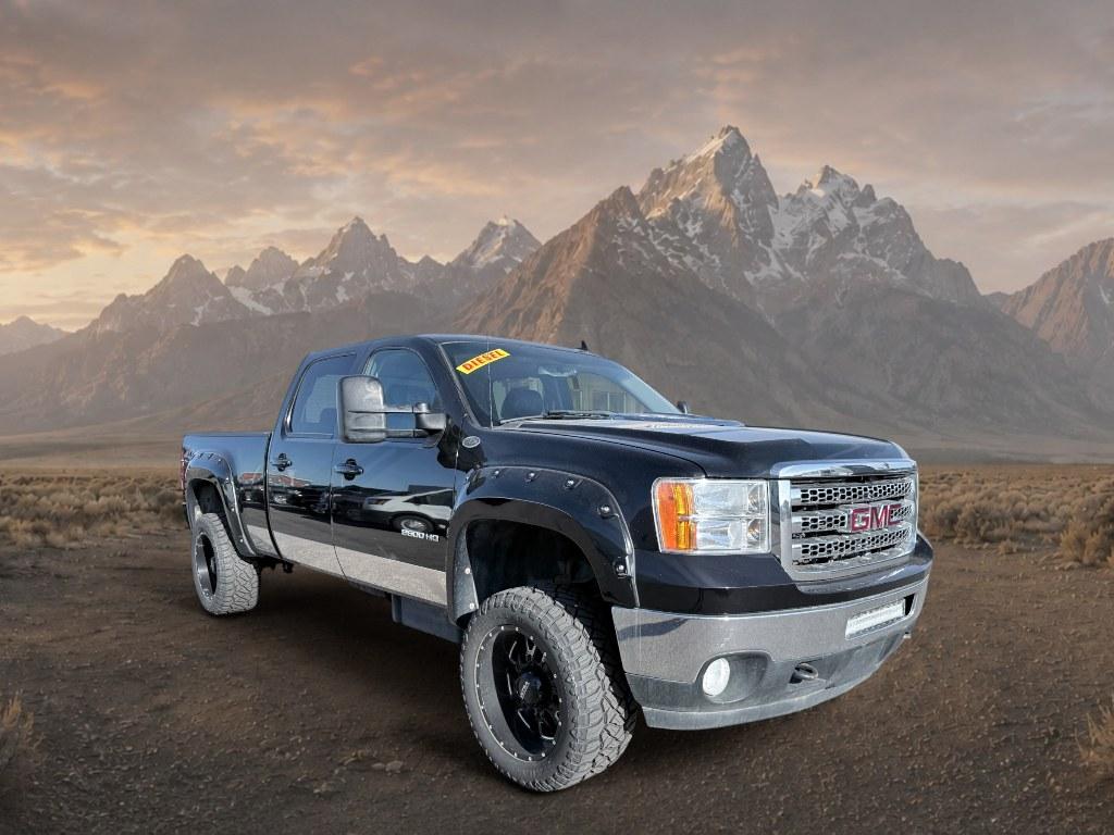 2013 Steel Gray Metallic /Ebony GMC Sierra SLT (1GT121E86DF) with an V8, 6.6L engine, 6-Speed Automatic transmission, located at 1175 N Woodruff Ave, Idaho Falls, ID, 83401, 43.506901, -111.999657 - <b>Vehicle Details</b><br>Looking for a heavy-duty pickup that blends power, comfort, and capability? This pre-owned 2013 GMC Sierra 2500 SLT with 4WD and a V8 6.6L Diesel engine is ready to tackle tough jobs and weekend adventures alike. Built for drivers who need serious towing strength and confid- Photo#5