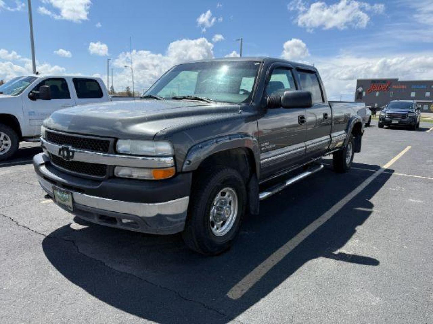 2001 GRAY /Graphite Cloth Chevrolet Silverado 2500HD LS Crew Cab Long Bed 4WD (1GCHK23131F) with an 6.6L V8 OHV 32V TURBO DIESEL engine, 5-Speed Automatic transmission, located at 1235 N Woodruff Ave., Idaho Falls, 83401, (208) 523-1053, 43.507172, -112.000488 - At Timberline Auto, finding a great deal on your next vehicle is always easy! Our experienced sales staff's goal is to help find you the right vehicle at the right price! Our knowledgeable finance department has options for almost any credit score. We offer extended service contract options to prote - Photo#0