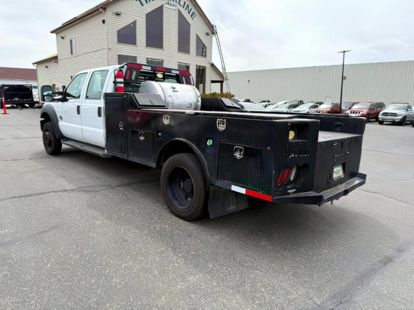 2015 WHITE /CLOTH Ford F-550 Crew Cab DRW 4WD (1FD0W5HT7FE) with an 6.7L V8 OHV 16V DIESEL engine, AUTOMATIC transmission, located at 1235 N Woodruff Ave., Idaho Falls, 83401, (208) 523-1053, 43.507172, -112.000488 - At Timberline Auto, finding a great deal on your next vehicle is always easy! Our experienced sales staff's goal is to help find you the right vehicle at the right price! Our knowledgeable finance department has options for almost any credit score. We offer extended service contract options to prote - Photo#2