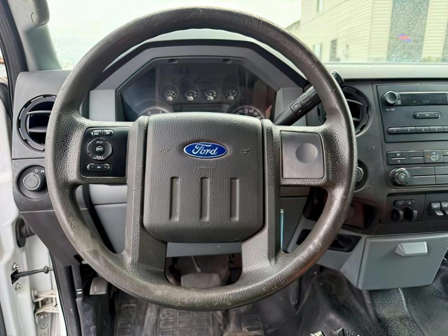 2015 WHITE /CLOTH Ford F-550 Crew Cab DRW 4WD (1FD0W5HT7FE) with an 6.7L V8 OHV 16V DIESEL engine, AUTOMATIC transmission, located at 1235 N Woodruff Ave., Idaho Falls, 83401, (208) 523-1053, 43.507172, -112.000488 - At Timberline Auto, finding a great deal on your next vehicle is always easy! Our experienced sales staff's goal is to help find you the right vehicle at the right price! Our knowledgeable finance department has options for almost any credit score. We offer extended service contract options to prote - Photo#10
