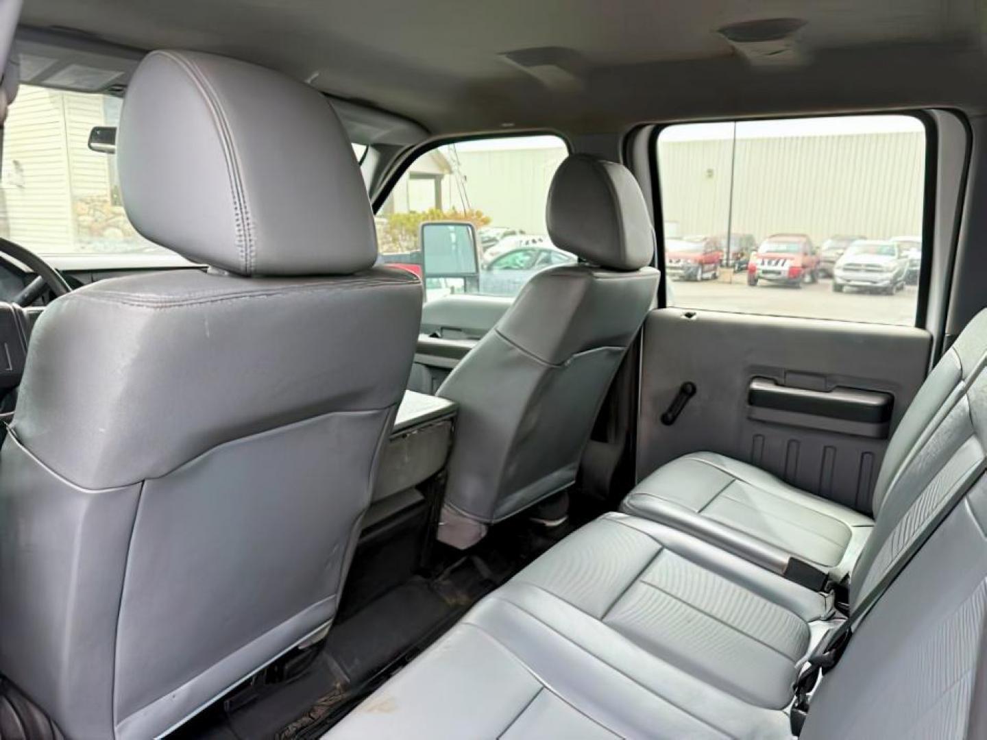 2015 WHITE /CLOTH Ford F-550 Crew Cab DRW 4WD (1FD0W5HT7FE) with an 6.7L V8 OHV 16V DIESEL engine, AUTOMATIC transmission, located at 1235 N Woodruff Ave., Idaho Falls, 83401, (208) 523-1053, 43.507172, -112.000488 - At Timberline Auto, finding a great deal on your next vehicle is always easy! Our experienced sales staff's goal is to help find you the right vehicle at the right price! Our knowledgeable finance department has options for almost any credit score. We offer extended service contract options to prote - Photo#15