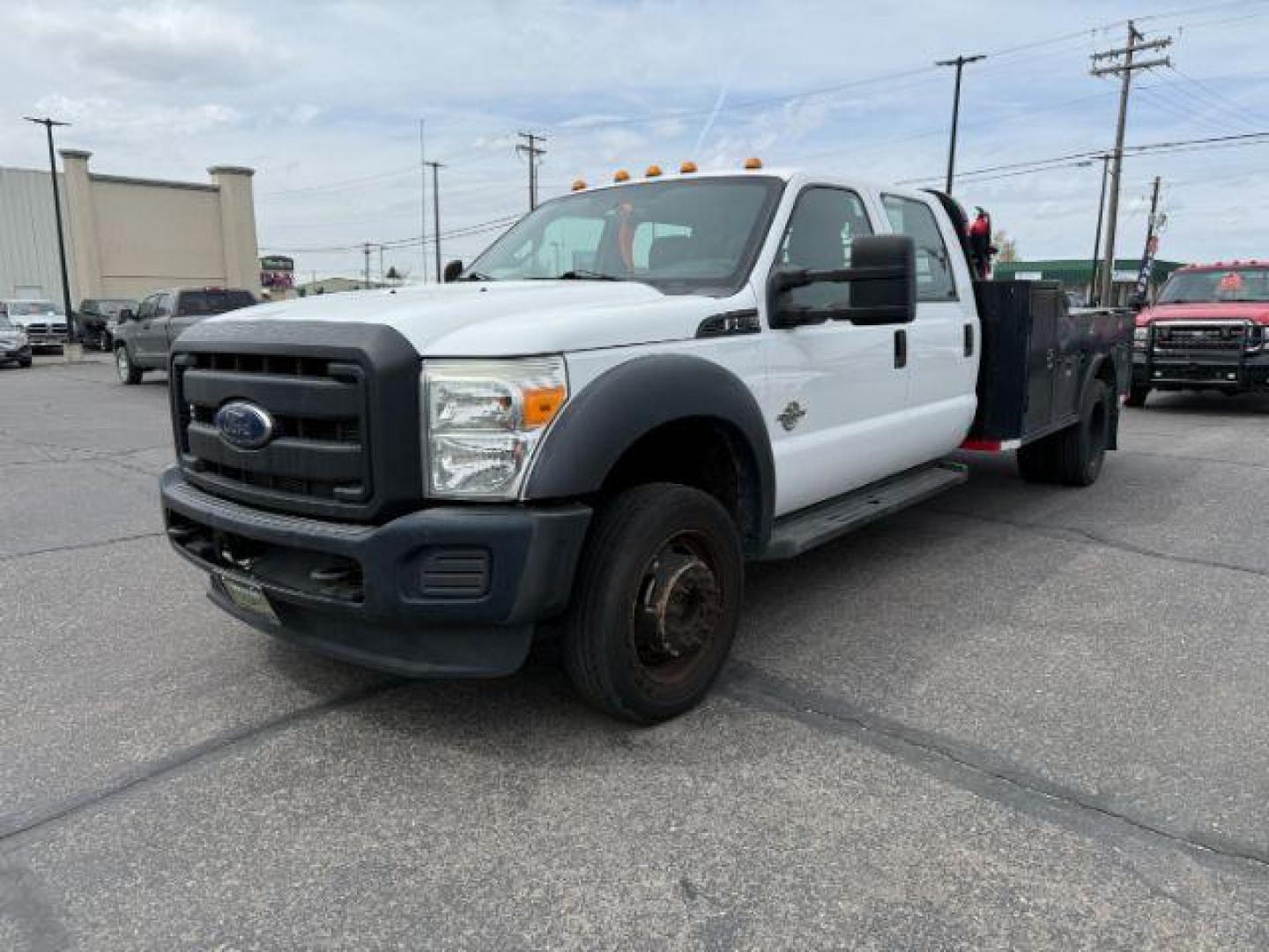 2015 WHITE /CLOTH Ford F-550 Crew Cab DRW 4WD (1FD0W5HT7FE) with an 6.7L V8 OHV 16V DIESEL engine, AUTOMATIC transmission, located at 1235 N Woodruff Ave., Idaho Falls, 83401, (208) 523-1053, 43.507172, -112.000488 - At Timberline Auto, finding a great deal on your next vehicle is always easy! Our experienced sales staff's goal is to help find you the right vehicle at the right price! Our knowledgeable finance department has options for almost any credit score. We offer extended service contract options to prote - Photo#0