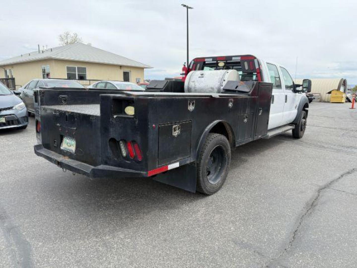 2015 WHITE /CLOTH Ford F-550 Crew Cab DRW 4WD (1FD0W5HT7FE) with an 6.7L V8 OHV 16V DIESEL engine, AUTOMATIC transmission, located at 1235 N Woodruff Ave., Idaho Falls, 83401, (208) 523-1053, 43.507172, -112.000488 - At Timberline Auto, finding a great deal on your next vehicle is always easy! Our experienced sales staff's goal is to help find you the right vehicle at the right price! Our knowledgeable finance department has options for almost any credit score. We offer extended service contract options to prote - Photo#4