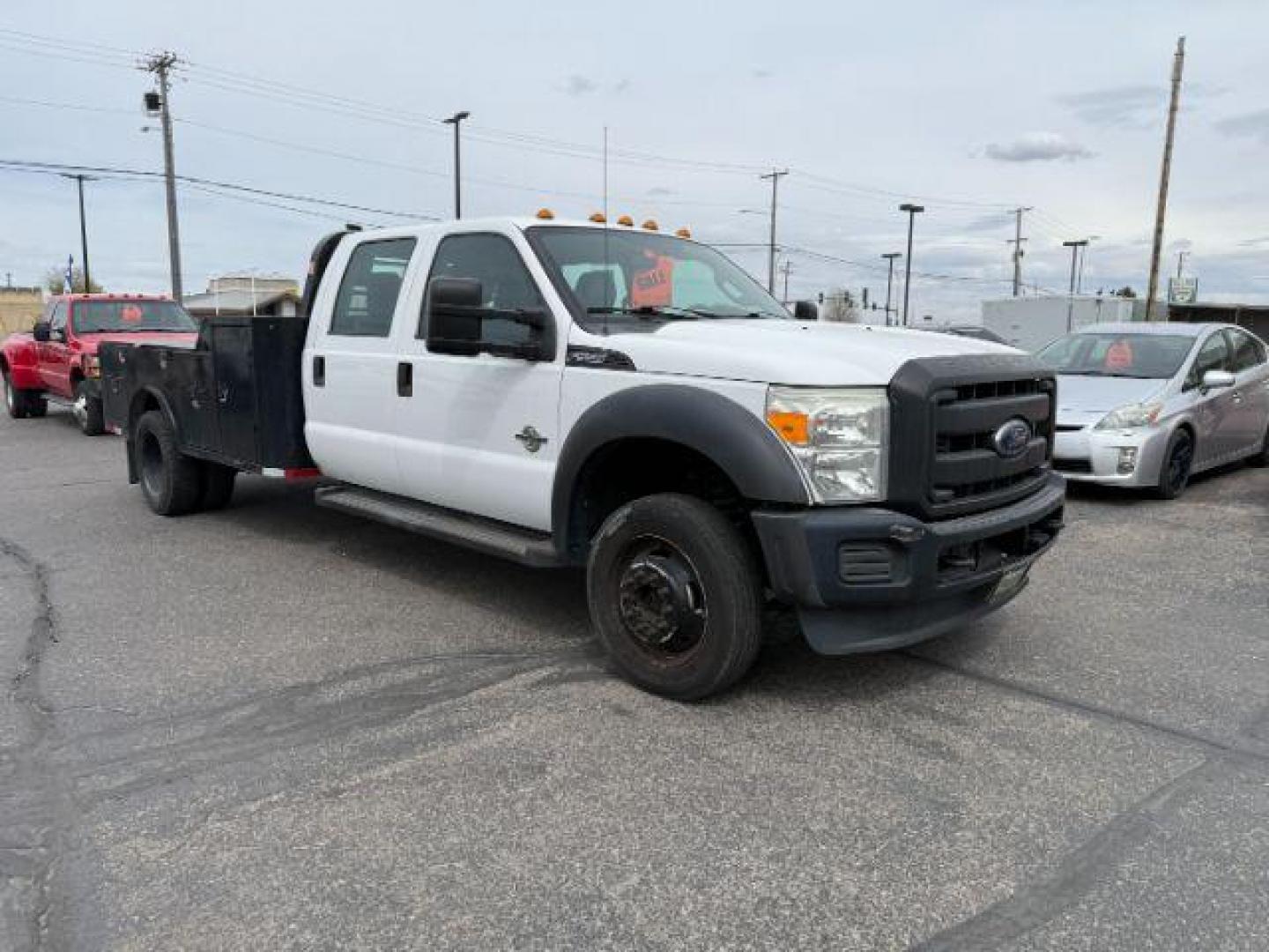 2015 WHITE /CLOTH Ford F-550 Crew Cab DRW 4WD (1FD0W5HT7FE) with an 6.7L V8 OHV 16V DIESEL engine, AUTOMATIC transmission, located at 1235 N Woodruff Ave., Idaho Falls, 83401, (208) 523-1053, 43.507172, -112.000488 - At Timberline Auto, finding a great deal on your next vehicle is always easy! Our experienced sales staff's goal is to help find you the right vehicle at the right price! Our knowledgeable finance department has options for almost any credit score. We offer extended service contract options to prote - Photo#6