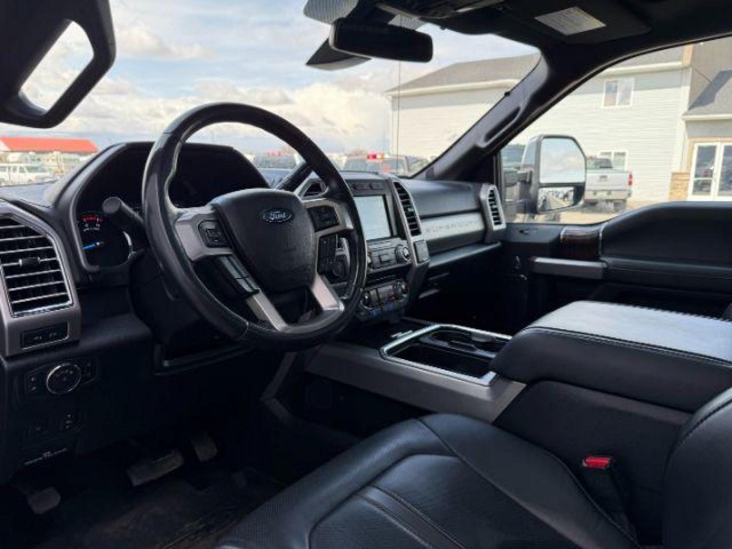 2017 BLACK /LEATHER Ford F-350 SD Platinum (1FT8W3DT7HE) with an 6.7 engine, AUTOMATIC transmission, located at 1235 N Woodruff Ave., Idaho Falls, 83401, (208) 523-1053, 43.507172, -112.000488 - Photo#12