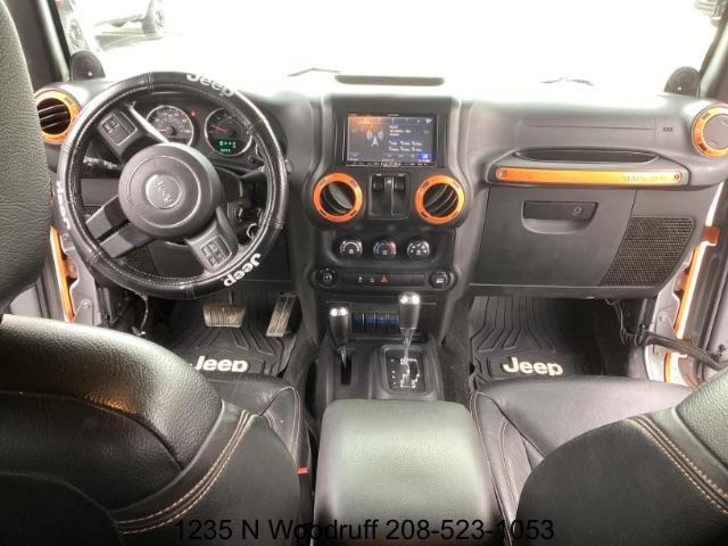 2014 ORANGE /Black Jeep Wrangler Sport 4WD (1C4AJWAG5EL) with an 3.6L V6 DOHC 24V FFV engine, 5-Speed Automatic transmission, located at 1235 N Woodruff Ave., Idaho Falls, 83401, (208) 523-1053, 43.507172, -112.000488 - At Timberline Auto, finding a great deal on your next vehicle is always easy! Our experienced sales staff's goal is to help find you the right vehicle at the right price! Our knowledgeable finance department has options for almost any credit score. We offer extended service contract options to prote - Photo#10