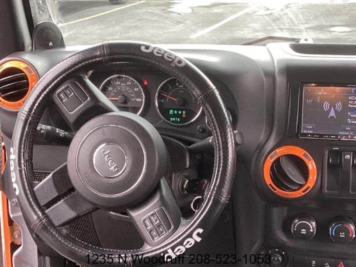 2014 ORANGE /Black Jeep Wrangler Sport 4WD (1C4AJWAG5EL) with an 3.6L V6 DOHC 24V FFV engine, 5-Speed Automatic transmission, located at 1235 N Woodruff Ave., Idaho Falls, 83401, (208) 523-1053, 43.507172, -112.000488 - At Timberline Auto, finding a great deal on your next vehicle is always easy! Our experienced sales staff's goal is to help find you the right vehicle at the right price! Our knowledgeable finance department has options for almost any credit score. We offer extended service contract options to prote - Photo#12