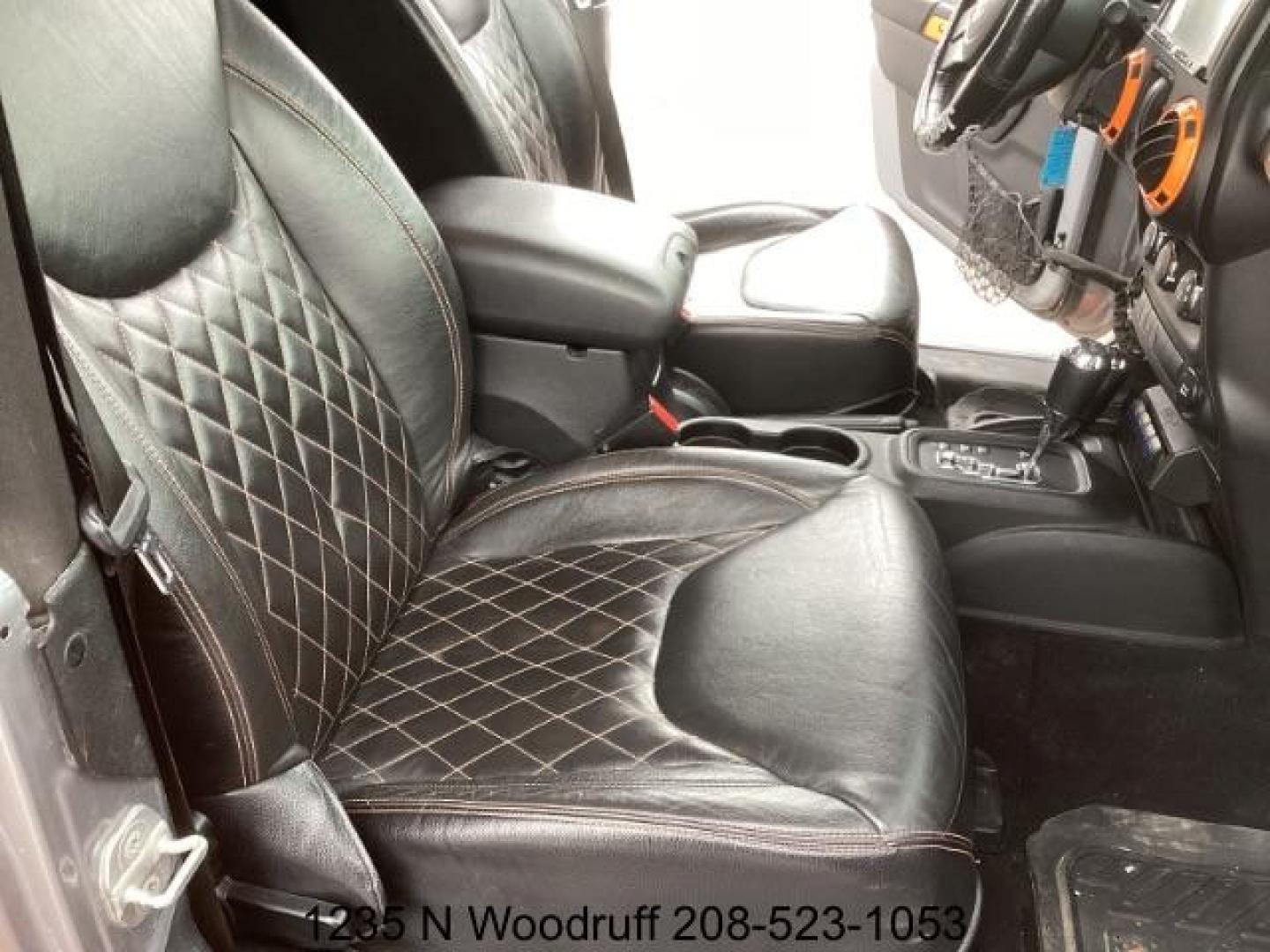 2014 ORANGE /Black Jeep Wrangler Sport 4WD (1C4AJWAG5EL) with an 3.6L V6 DOHC 24V FFV engine, 5-Speed Automatic transmission, located at 1235 N Woodruff Ave., Idaho Falls, 83401, (208) 523-1053, 43.507172, -112.000488 - At Timberline Auto, finding a great deal on your next vehicle is always easy! Our experienced sales staff's goal is to help find you the right vehicle at the right price! Our knowledgeable finance department has options for almost any credit score. We offer extended service contract options to prote - Photo#14