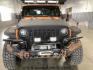 2014 ORANGE /Black Jeep Wrangler Sport 4WD (1C4AJWAG5EL) with an 3.6L V6 DOHC 24V FFV engine, 5-Speed Automatic transmission, located at 1235 N Woodruff Ave., Idaho Falls, 83401, (208) 523-1053, 43.507172, -112.000488 - At Timberline Auto, finding a great deal on your next vehicle is always easy! Our experienced sales staff's goal is to help find you the right vehicle at the right price! Our knowledgeable finance department has options for almost any credit score. We offer extended service contract options to prote - Photo#3