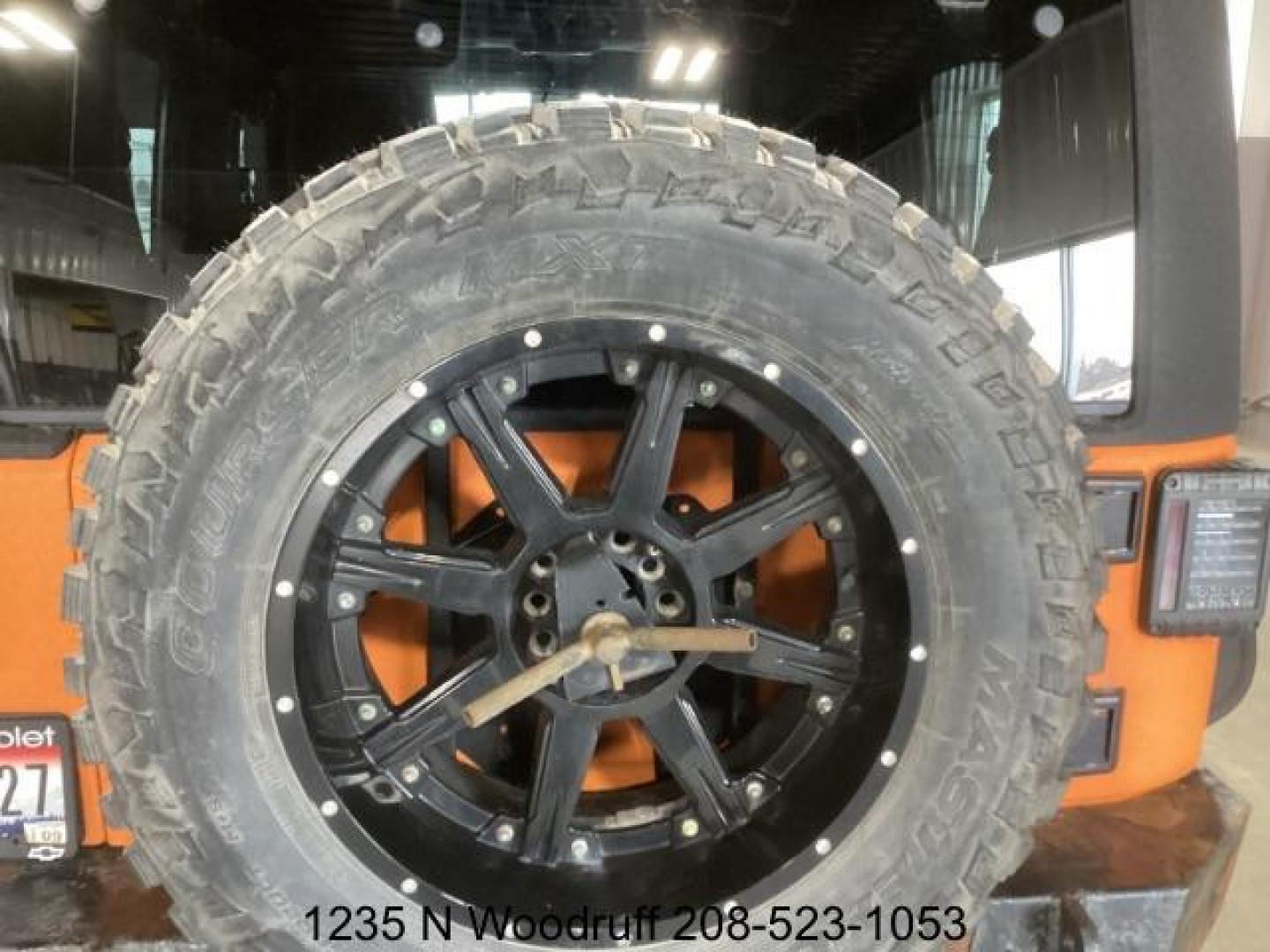 2014 ORANGE /Black Jeep Wrangler Sport 4WD (1C4AJWAG5EL) with an 3.6L V6 DOHC 24V FFV engine, 5-Speed Automatic transmission, located at 1235 N Woodruff Ave., Idaho Falls, 83401, (208) 523-1053, 43.507172, -112.000488 - At Timberline Auto, finding a great deal on your next vehicle is always easy! Our experienced sales staff's goal is to help find you the right vehicle at the right price! Our knowledgeable finance department has options for almost any credit score. We offer extended service contract options to prote - Photo#6