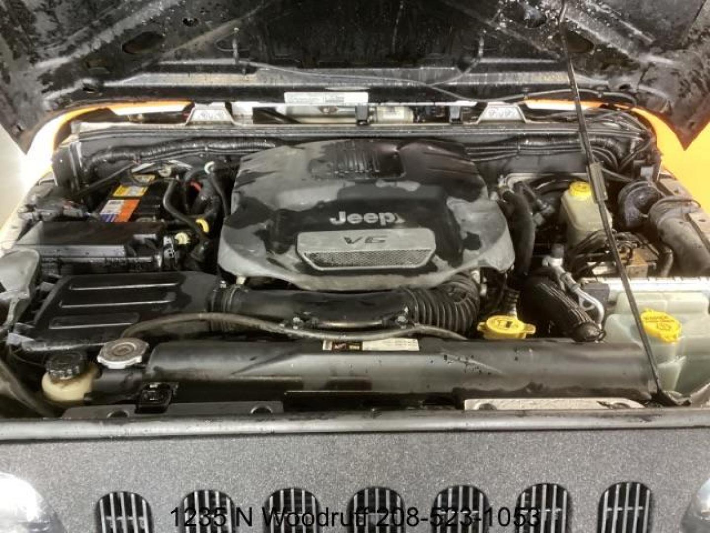 2014 ORANGE /Black Jeep Wrangler Sport 4WD (1C4AJWAG5EL) with an 3.6L V6 DOHC 24V FFV engine, 5-Speed Automatic transmission, located at 1235 N Woodruff Ave., Idaho Falls, 83401, (208) 523-1053, 43.507172, -112.000488 - At Timberline Auto, finding a great deal on your next vehicle is always easy! Our experienced sales staff's goal is to help find you the right vehicle at the right price! Our knowledgeable finance department has options for almost any credit score. We offer extended service contract options to prote - Photo#7