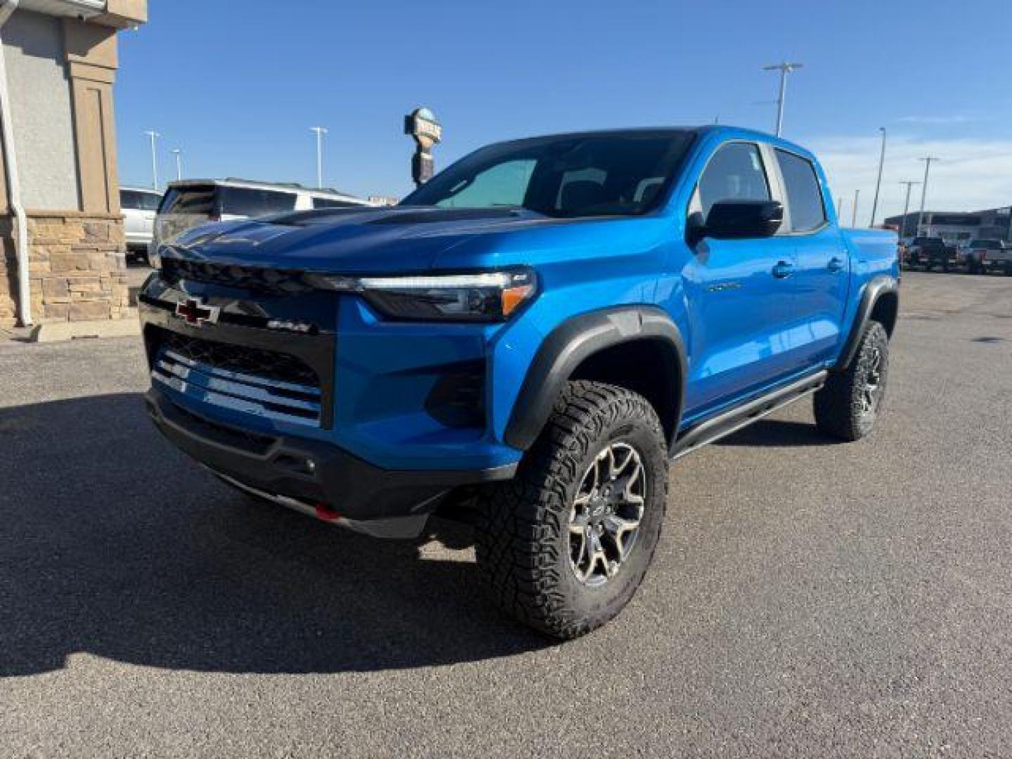 2024 Glacier Blue Metallic /Jet Black/Artem Chevrolet Colorado (1GCPTFEK0R1) with an 27L L4 DOHC 16V TURBO engine, Automatic transmission, located at 1175 N Woodruff Ave, Idaho Falls, ID, 83401, 43.506901, -111.999657 - At Timberline Auto, finding a great deal on your next vehicle is always easy! Our experienced sales staff's goal is to help find you the right vehicle at the right price! Our knowledgeable finance department has options for almost any credit score. We offer extended service contract options to prote - Photo#19