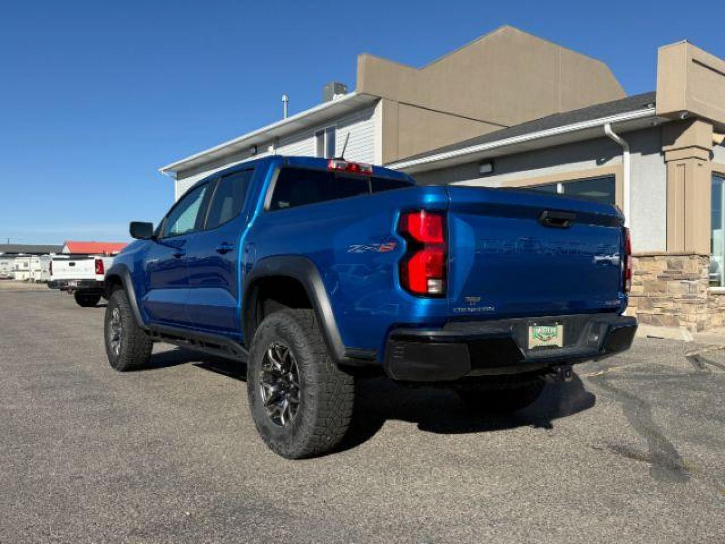 2024 Glacier Blue Metallic /Jet Black/Artem Chevrolet Colorado (1GCPTFEK0R1) with an 27L L4 DOHC 16V TURBO engine, Automatic transmission, located at 1175 N Woodruff Ave, Idaho Falls, ID, 83401, 43.506901, -111.999657 - At Timberline Auto, finding a great deal on your next vehicle is always easy! Our experienced sales staff's goal is to help find you the right vehicle at the right price! Our knowledgeable finance department has options for almost any credit score. We offer extended service contract options to prote - Photo#21