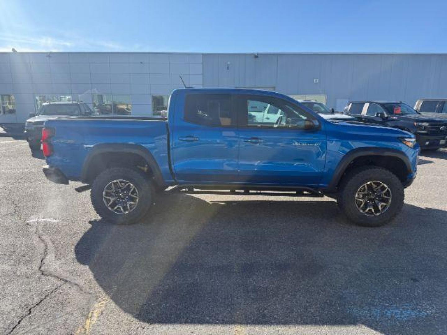 2024 Glacier Blue Metallic /Jet Black/Artem Chevrolet Colorado (1GCPTFEK0R1) with an 27L L4 DOHC 16V TURBO engine, Automatic transmission, located at 1175 N Woodruff Ave, Idaho Falls, ID, 83401, 43.506901, -111.999657 - At Timberline Auto, finding a great deal on your next vehicle is always easy! Our experienced sales staff's goal is to help find you the right vehicle at the right price! Our knowledgeable finance department has options for almost any credit score. We offer extended service contract options to prote - Photo#26