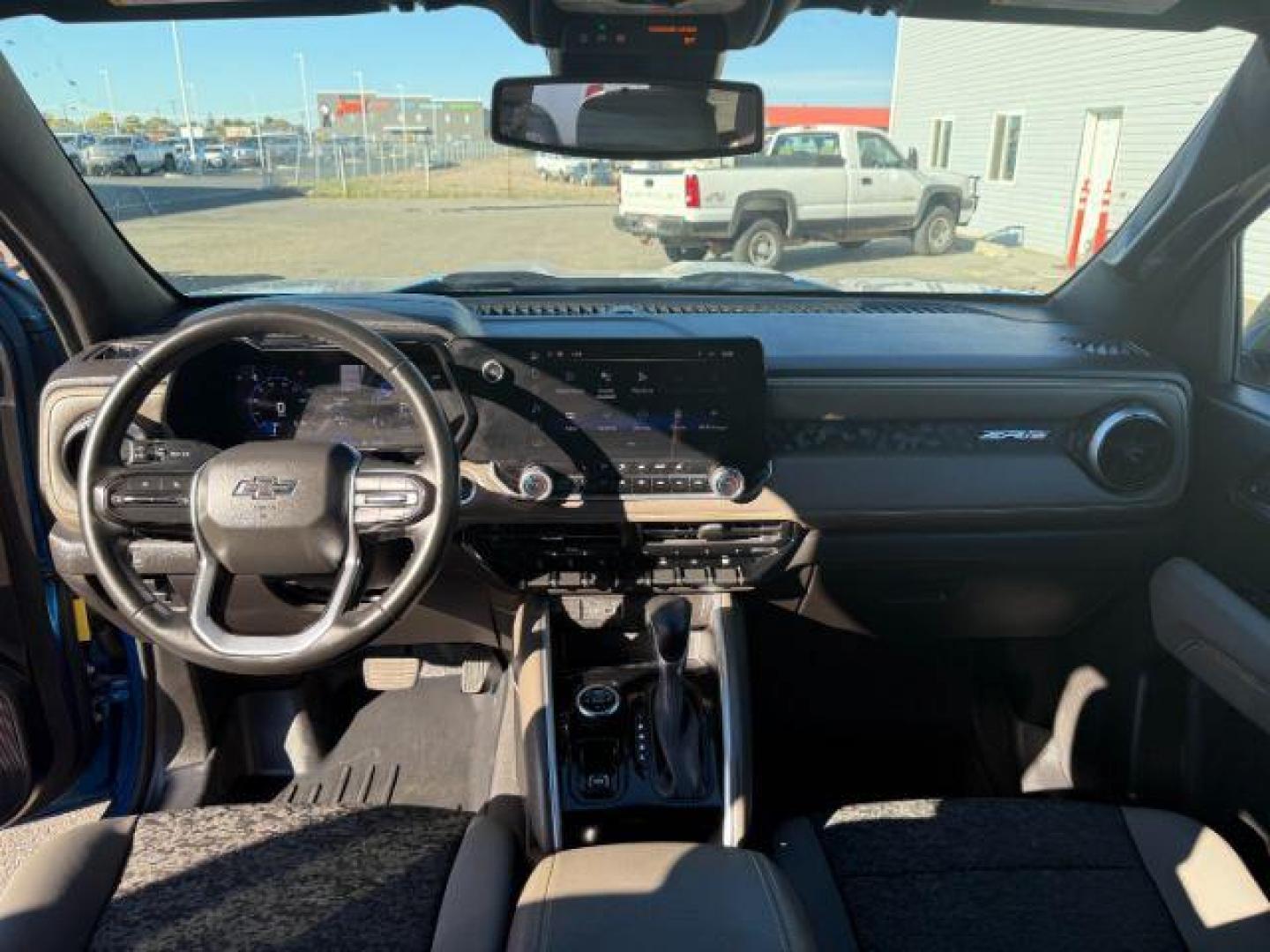 2024 Glacier Blue Metallic /Jet Black/Artem Chevrolet Colorado (1GCPTFEK0R1) with an 27L L4 DOHC 16V TURBO engine, Automatic transmission, located at 1175 N Woodruff Ave, Idaho Falls, ID, 83401, 43.506901, -111.999657 - At Timberline Auto, finding a great deal on your next vehicle is always easy! Our experienced sales staff's goal is to help find you the right vehicle at the right price! Our knowledgeable finance department has options for almost any credit score. We offer extended service contract options to prote - Photo#41