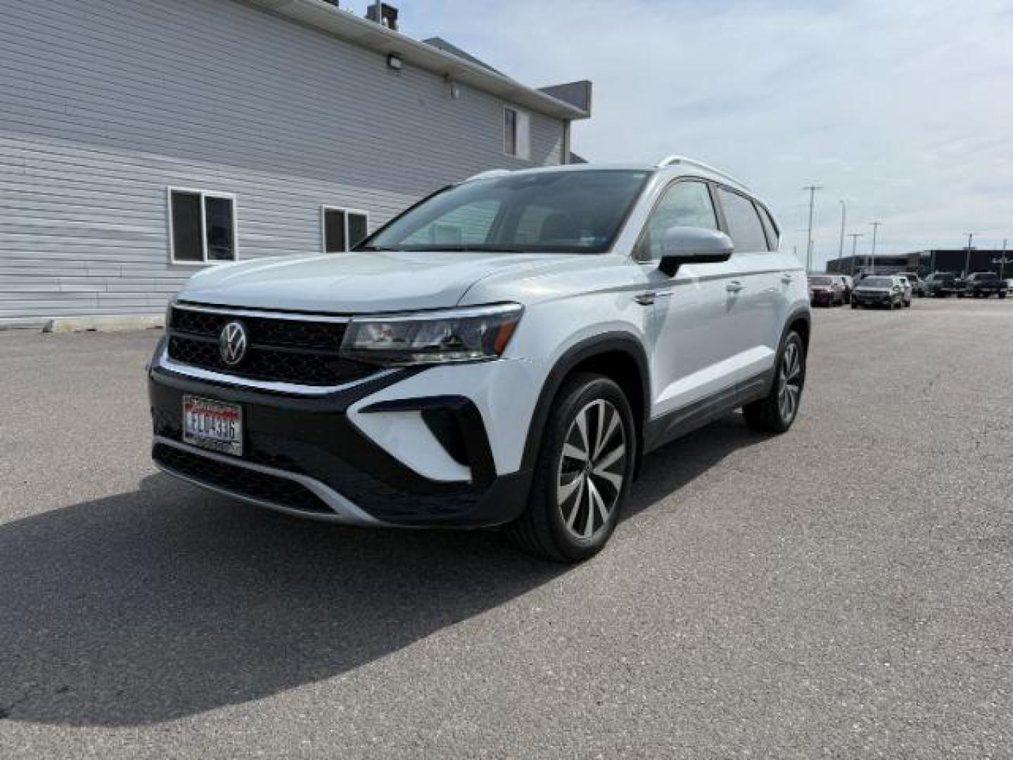 2023 Pure White /Gray Volkswagen Taos SE 4Motion (3VVNX7B27PM) with an 1.5L L4 SFI DOHC 16V engine, 7-Speed Automatic transmission, located at 1235 N Woodruff Ave., Idaho Falls, 83401, (208) 523-1053, 43.507172, -112.000488 - At Timberline Auto, finding a great deal on your next vehicle is always easy! Our experienced sales staff's goal is to help find you the right vehicle at the right price! Our knowledgeable finance department has options for almost any credit score. We offer extended service contract options to prote - Photo#0