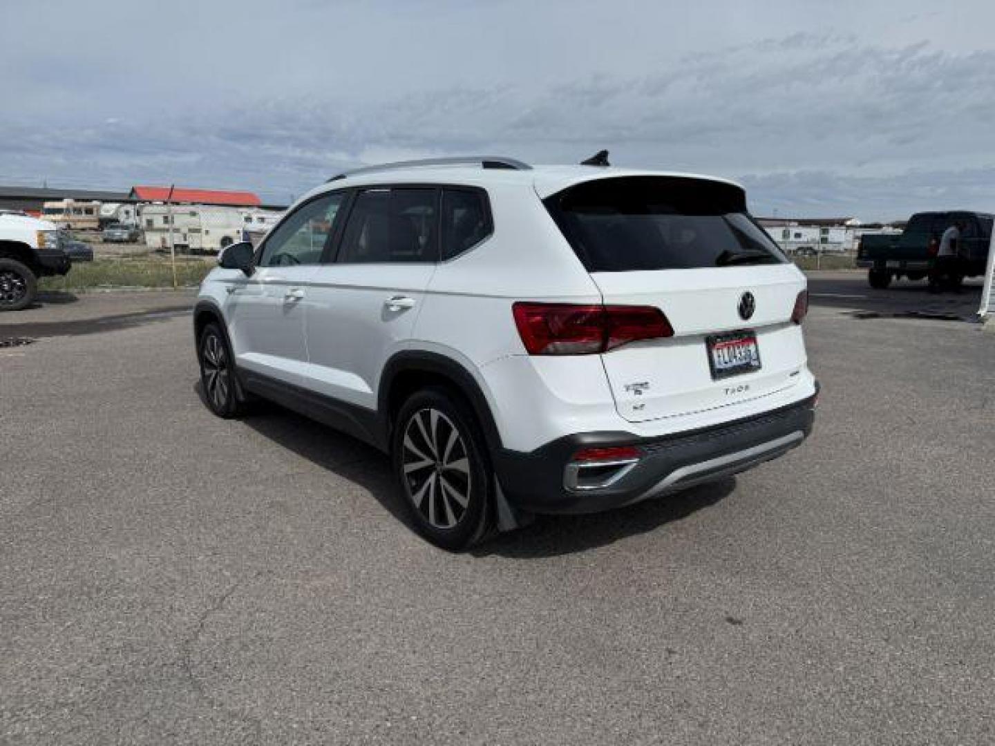 2023 Pure White /Gray Volkswagen Taos SE 4Motion (3VVNX7B27PM) with an 1.5L L4 SFI DOHC 16V engine, 7-Speed Automatic transmission, located at 1235 N Woodruff Ave., Idaho Falls, 83401, (208) 523-1053, 43.507172, -112.000488 - At Timberline Auto, finding a great deal on your next vehicle is always easy! Our experienced sales staff's goal is to help find you the right vehicle at the right price! Our knowledgeable finance department has options for almost any credit score. We offer extended service contract options to prote - Photo#2