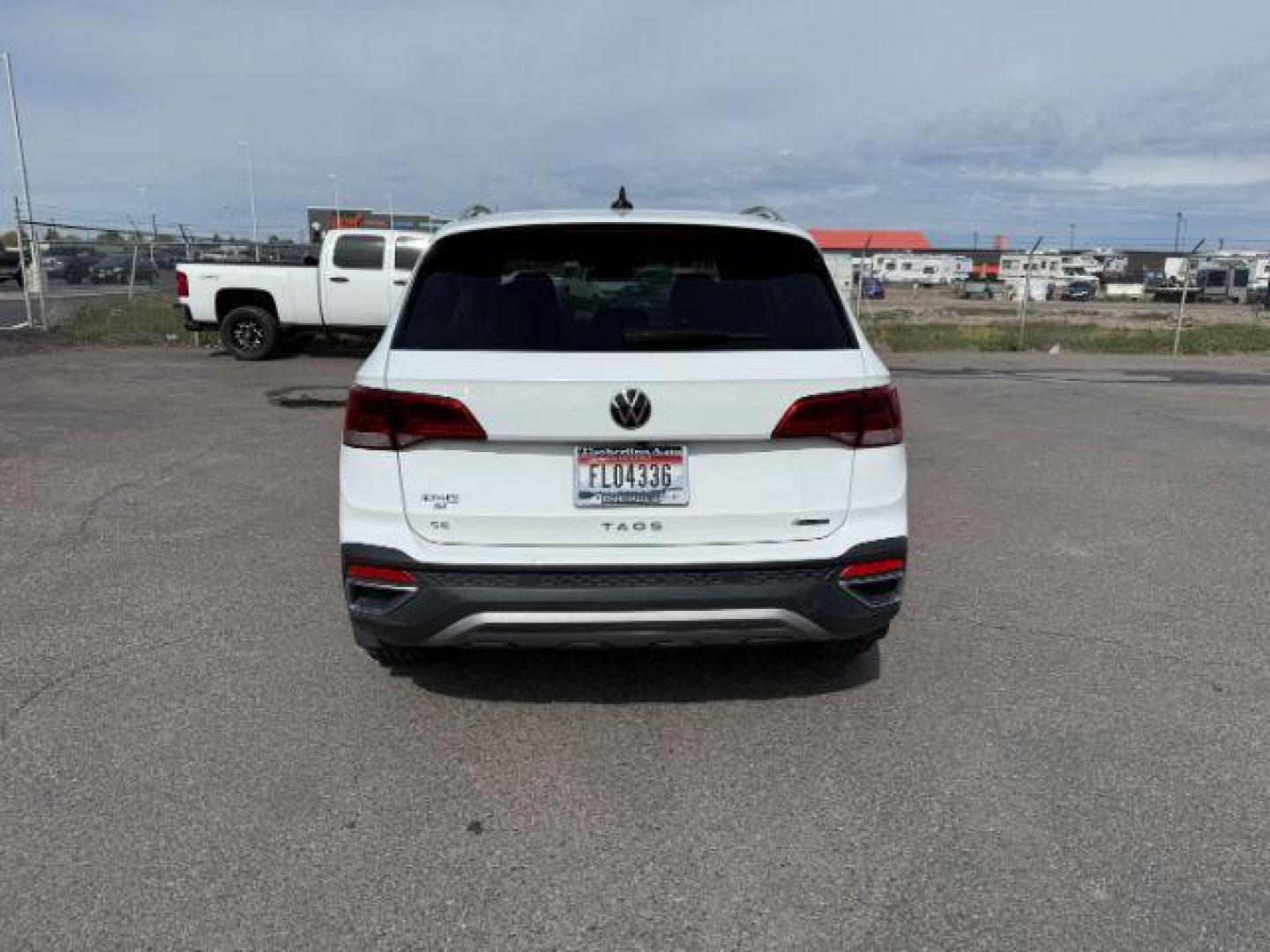2023 Pure White /Gray Volkswagen Taos SE 4Motion (3VVNX7B27PM) with an 1.5L L4 SFI DOHC 16V engine, 7-Speed Automatic transmission, located at 1235 N Woodruff Ave., Idaho Falls, 83401, (208) 523-1053, 43.507172, -112.000488 - At Timberline Auto, finding a great deal on your next vehicle is always easy! Our experienced sales staff's goal is to help find you the right vehicle at the right price! Our knowledgeable finance department has options for almost any credit score. We offer extended service contract options to prote - Photo#3