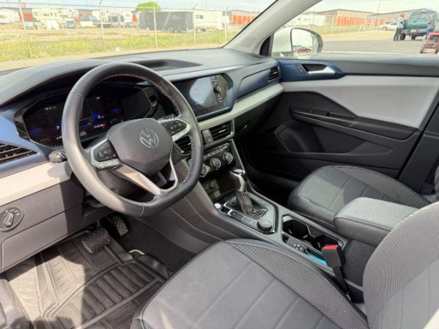 2023 Pure White /Gray Volkswagen Taos SE 4Motion (3VVNX7B27PM) with an 1.5L L4 SFI DOHC 16V engine, 7-Speed Automatic transmission, located at 1235 N Woodruff Ave., Idaho Falls, 83401, (208) 523-1053, 43.507172, -112.000488 - At Timberline Auto, finding a great deal on your next vehicle is always easy! Our experienced sales staff's goal is to help find you the right vehicle at the right price! Our knowledgeable finance department has options for almost any credit score. We offer extended service contract options to prote - Photo#11