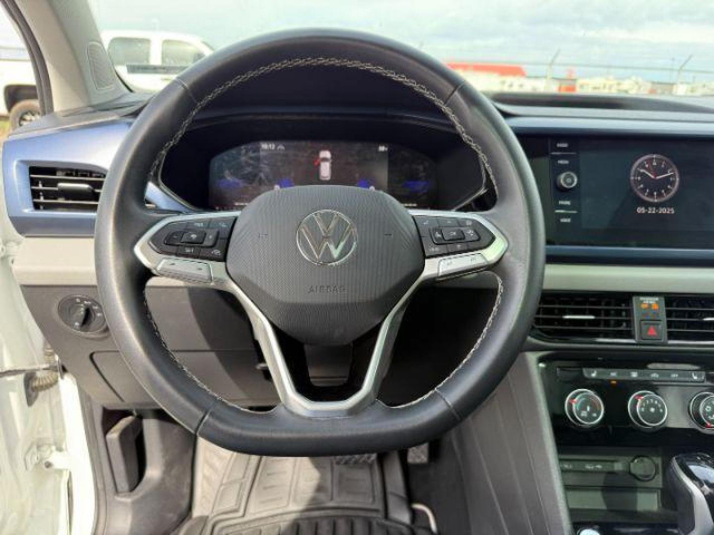 2023 Pure White /Gray Volkswagen Taos SE 4Motion (3VVNX7B27PM) with an 1.5L L4 SFI DOHC 16V engine, 7-Speed Automatic transmission, located at 1235 N Woodruff Ave., Idaho Falls, 83401, (208) 523-1053, 43.507172, -112.000488 - At Timberline Auto, finding a great deal on your next vehicle is always easy! Our experienced sales staff's goal is to help find you the right vehicle at the right price! Our knowledgeable finance department has options for almost any credit score. We offer extended service contract options to prote - Photo#12