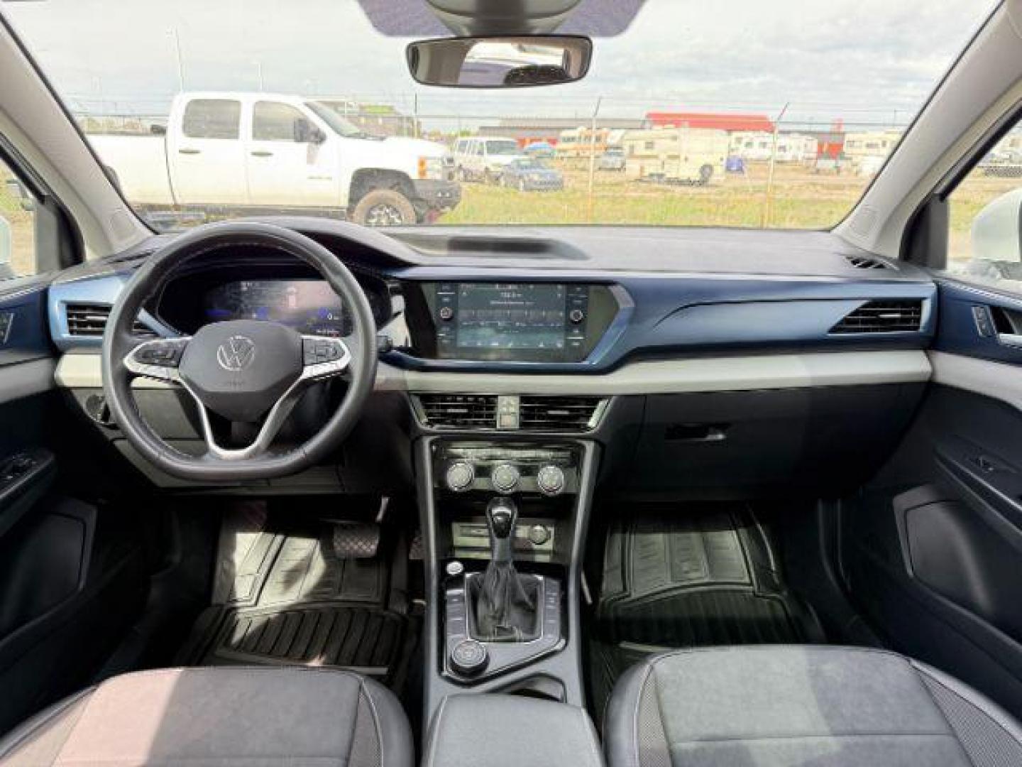 2023 Pure White /Gray Volkswagen Taos SE 4Motion (3VVNX7B27PM) with an 1.5L L4 SFI DOHC 16V engine, 7-Speed Automatic transmission, located at 1235 N Woodruff Ave., Idaho Falls, 83401, (208) 523-1053, 43.507172, -112.000488 - At Timberline Auto, finding a great deal on your next vehicle is always easy! Our experienced sales staff's goal is to help find you the right vehicle at the right price! Our knowledgeable finance department has options for almost any credit score. We offer extended service contract options to prote - Photo#20