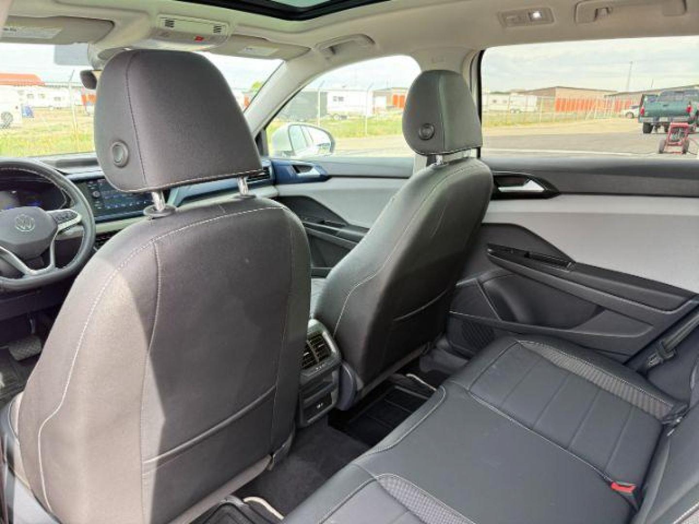 2023 Pure White /Gray Volkswagen Taos SE 4Motion (3VVNX7B27PM) with an 1.5L L4 SFI DOHC 16V engine, 7-Speed Automatic transmission, located at 1235 N Woodruff Ave., Idaho Falls, 83401, (208) 523-1053, 43.507172, -112.000488 - At Timberline Auto, finding a great deal on your next vehicle is always easy! Our experienced sales staff's goal is to help find you the right vehicle at the right price! Our knowledgeable finance department has options for almost any credit score. We offer extended service contract options to prote - Photo#21