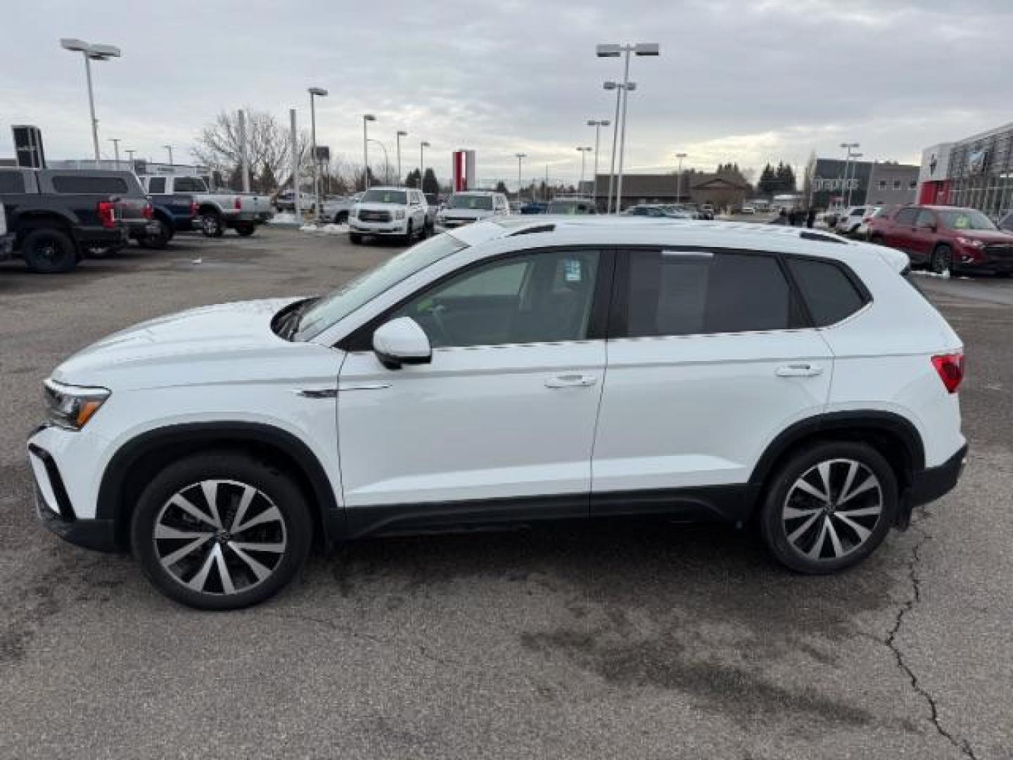 2023 Pure White /Black Volkswagen Taos SE 4Motion (3VVNX7B27PM) with an 1.5L L4 SFI DOHC 16V engine, 7-Speed Automatic transmission, located at 1235 N Woodruff Ave., Idaho Falls, 83401, (208) 523-1053, 43.507172, -112.000488 - At Timberline Auto, finding a great deal on your next vehicle is always easy! Our experienced sales staff's goal is to help find you the right vehicle at the right price! Our knowledgeable finance department has options for almost any credit score. We offer extended service contract options to prote - Photo#0