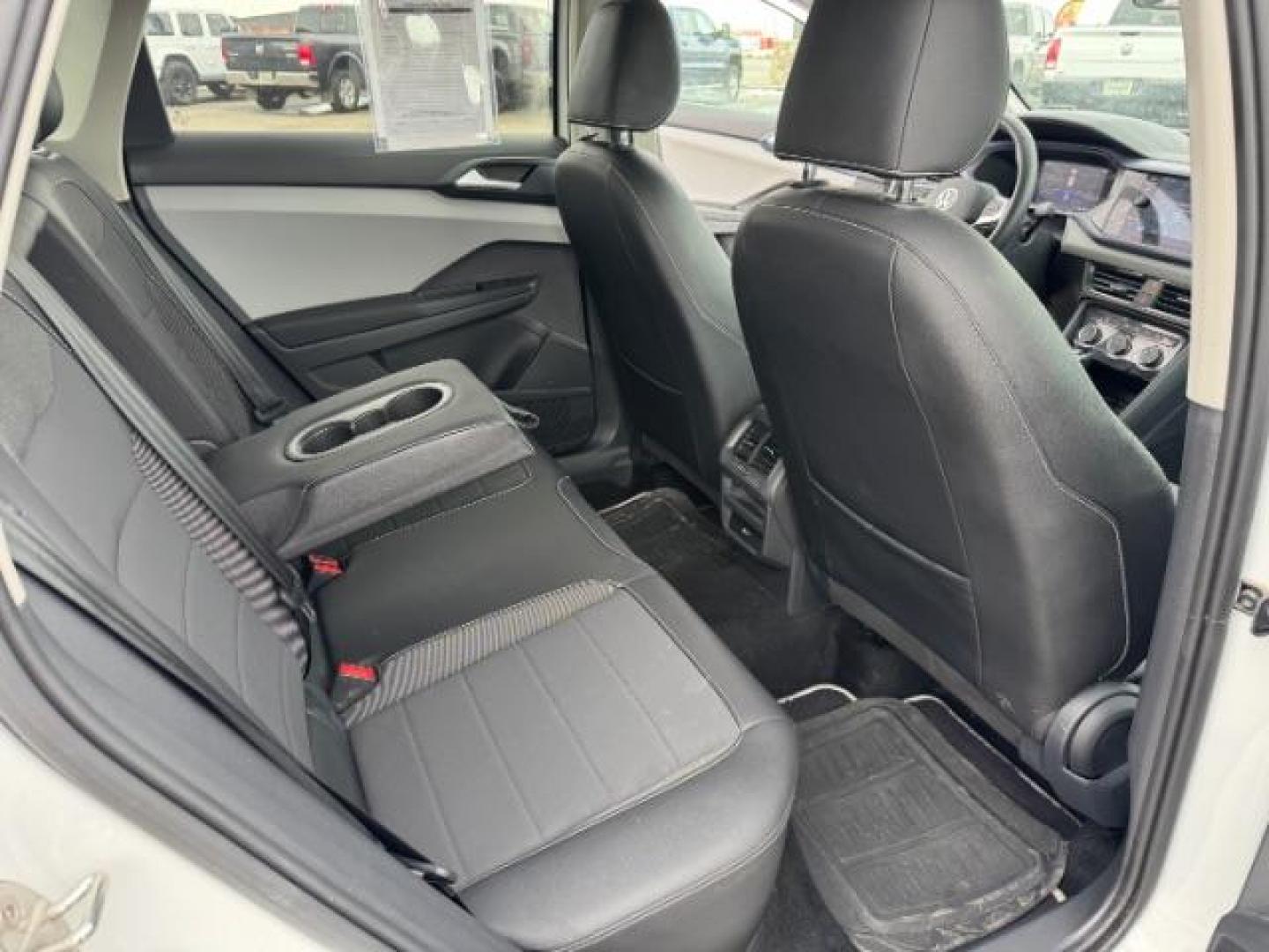 2023 Pure White /Black Volkswagen Taos SE 4Motion (3VVNX7B27PM) with an 1.5L L4 SFI DOHC 16V engine, 7-Speed Automatic transmission, located at 1235 N Woodruff Ave., Idaho Falls, 83401, (208) 523-1053, 43.507172, -112.000488 - At Timberline Auto, finding a great deal on your next vehicle is always easy! Our experienced sales staff's goal is to help find you the right vehicle at the right price! Our knowledgeable finance department has options for almost any credit score. We offer extended service contract options to prote - Photo#18