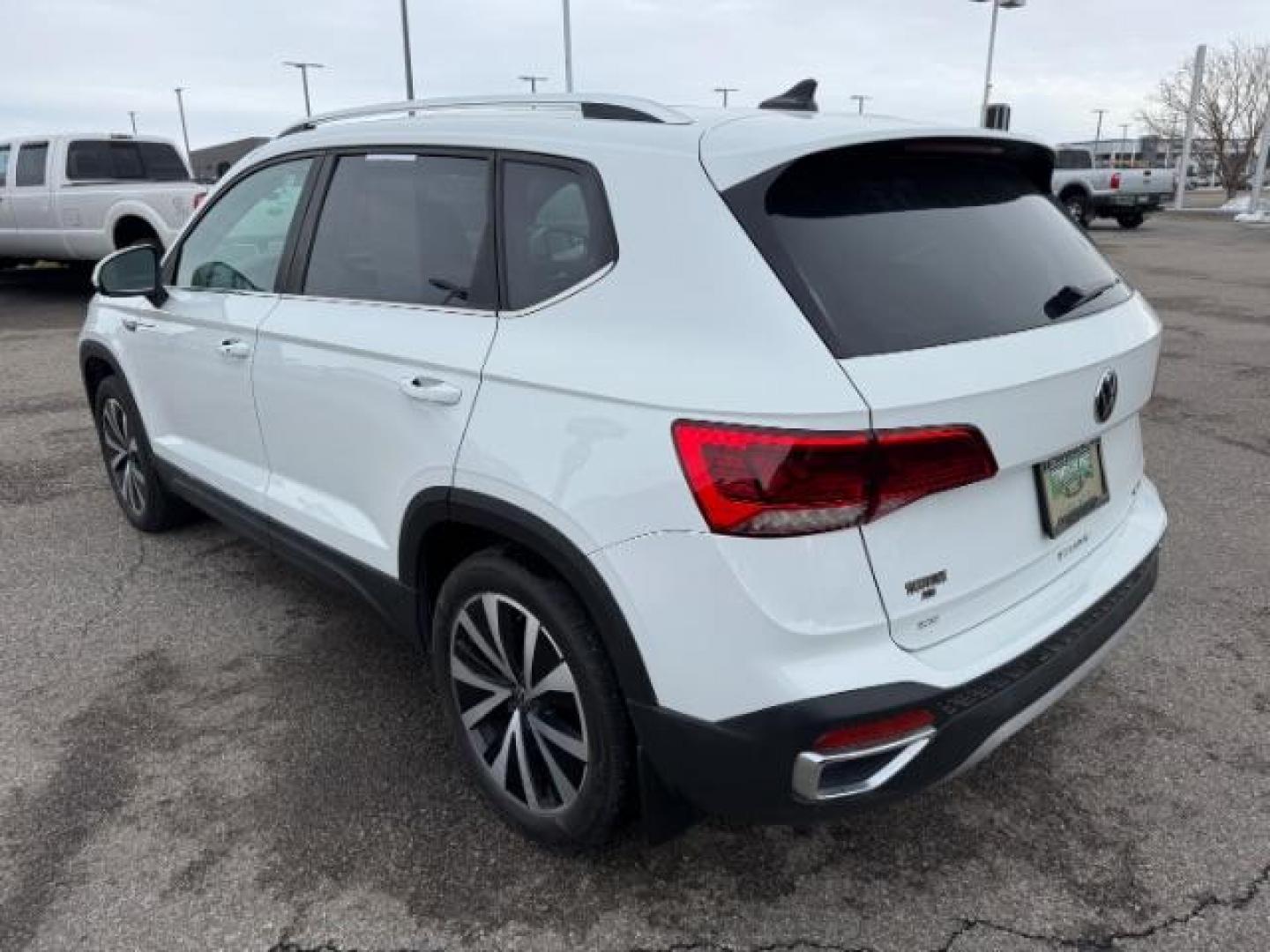 2023 Pure White /Black Volkswagen Taos SE 4Motion (3VVNX7B27PM) with an 1.5L L4 SFI DOHC 16V engine, 7-Speed Automatic transmission, located at 1235 N Woodruff Ave., Idaho Falls, 83401, (208) 523-1053, 43.507172, -112.000488 - At Timberline Auto, finding a great deal on your next vehicle is always easy! Our experienced sales staff's goal is to help find you the right vehicle at the right price! Our knowledgeable finance department has options for almost any credit score. We offer extended service contract options to prote - Photo#2