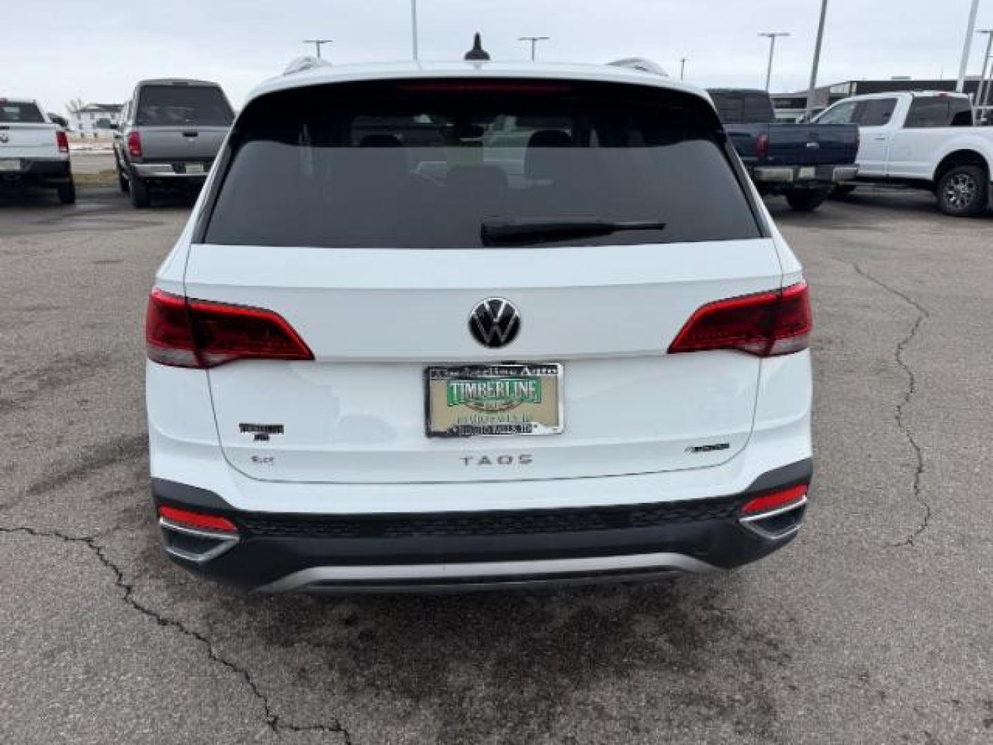 2023 Pure White /Black Volkswagen Taos SE 4Motion (3VVNX7B27PM) with an 1.5L L4 SFI DOHC 16V engine, 7-Speed Automatic transmission, located at 1235 N Woodruff Ave., Idaho Falls, 83401, (208) 523-1053, 43.507172, -112.000488 - At Timberline Auto, finding a great deal on your next vehicle is always easy! Our experienced sales staff's goal is to help find you the right vehicle at the right price! Our knowledgeable finance department has options for almost any credit score. We offer extended service contract options to prote - Photo#3