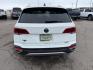 2023 Pure White /Black Volkswagen Taos SE 4Motion (3VVNX7B27PM) with an 1.5L L4 SFI DOHC 16V engine, 7-Speed Automatic transmission, located at 1235 N Woodruff Ave., Idaho Falls, 83401, (208) 523-1053, 43.507172, -112.000488 - At Timberline Auto, finding a great deal on your next vehicle is always easy! Our experienced sales staff's goal is to help find you the right vehicle at the right price! Our knowledgeable finance department has options for almost any credit score. We offer extended service contract options to prote - Photo#3