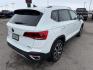 2023 Pure White /Black Volkswagen Taos SE 4Motion (3VVNX7B27PM) with an 1.5L L4 SFI DOHC 16V engine, 7-Speed Automatic transmission, located at 1235 N Woodruff Ave., Idaho Falls, 83401, (208) 523-1053, 43.507172, -112.000488 - At Timberline Auto, finding a great deal on your next vehicle is always easy! Our experienced sales staff's goal is to help find you the right vehicle at the right price! Our knowledgeable finance department has options for almost any credit score. We offer extended service contract options to prote - Photo#4