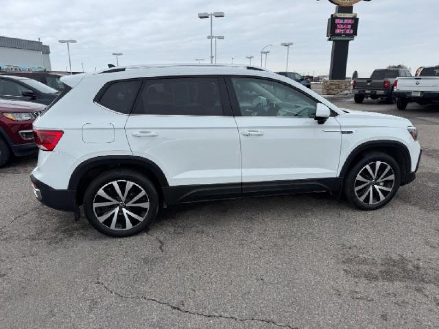 2023 Pure White /Black Volkswagen Taos SE 4Motion (3VVNX7B27PM) with an 1.5L L4 SFI DOHC 16V engine, 7-Speed Automatic transmission, located at 1235 N Woodruff Ave., Idaho Falls, 83401, (208) 523-1053, 43.507172, -112.000488 - At Timberline Auto, finding a great deal on your next vehicle is always easy! Our experienced sales staff's goal is to help find you the right vehicle at the right price! Our knowledgeable finance department has options for almost any credit score. We offer extended service contract options to prote - Photo#5