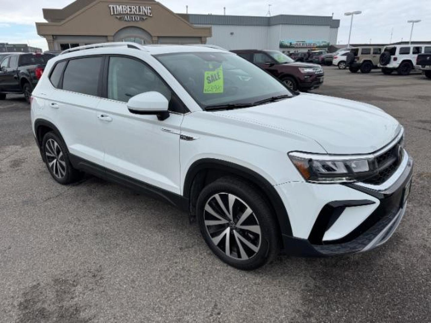 2023 Pure White /Black Volkswagen Taos SE 4Motion (3VVNX7B27PM) with an 1.5L L4 SFI DOHC 16V engine, 7-Speed Automatic transmission, located at 1235 N Woodruff Ave., Idaho Falls, 83401, (208) 523-1053, 43.507172, -112.000488 - At Timberline Auto, finding a great deal on your next vehicle is always easy! Our experienced sales staff's goal is to help find you the right vehicle at the right price! Our knowledgeable finance department has options for almost any credit score. We offer extended service contract options to prote - Photo#6