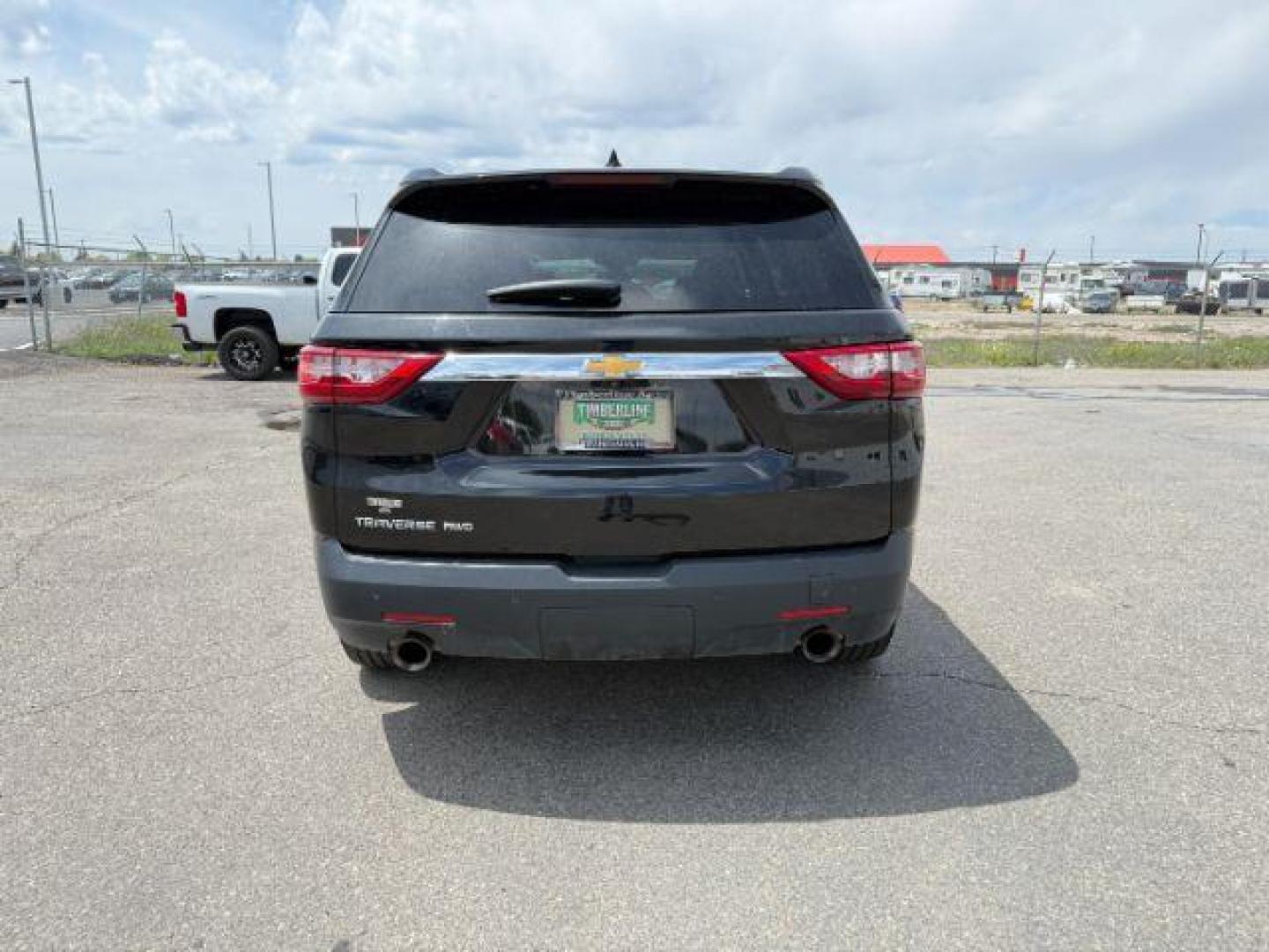 2021 BLACK Chevrolet Traverse LS FL AWD (1GNEVLKWXMJ) with an 3.6L V6 DOHC 24V engine, 9-Speed Automatic transmission, located at 1235 N Woodruff Ave., Idaho Falls, 83401, (208) 523-1053, 43.507172, -112.000488 - Photo#3
