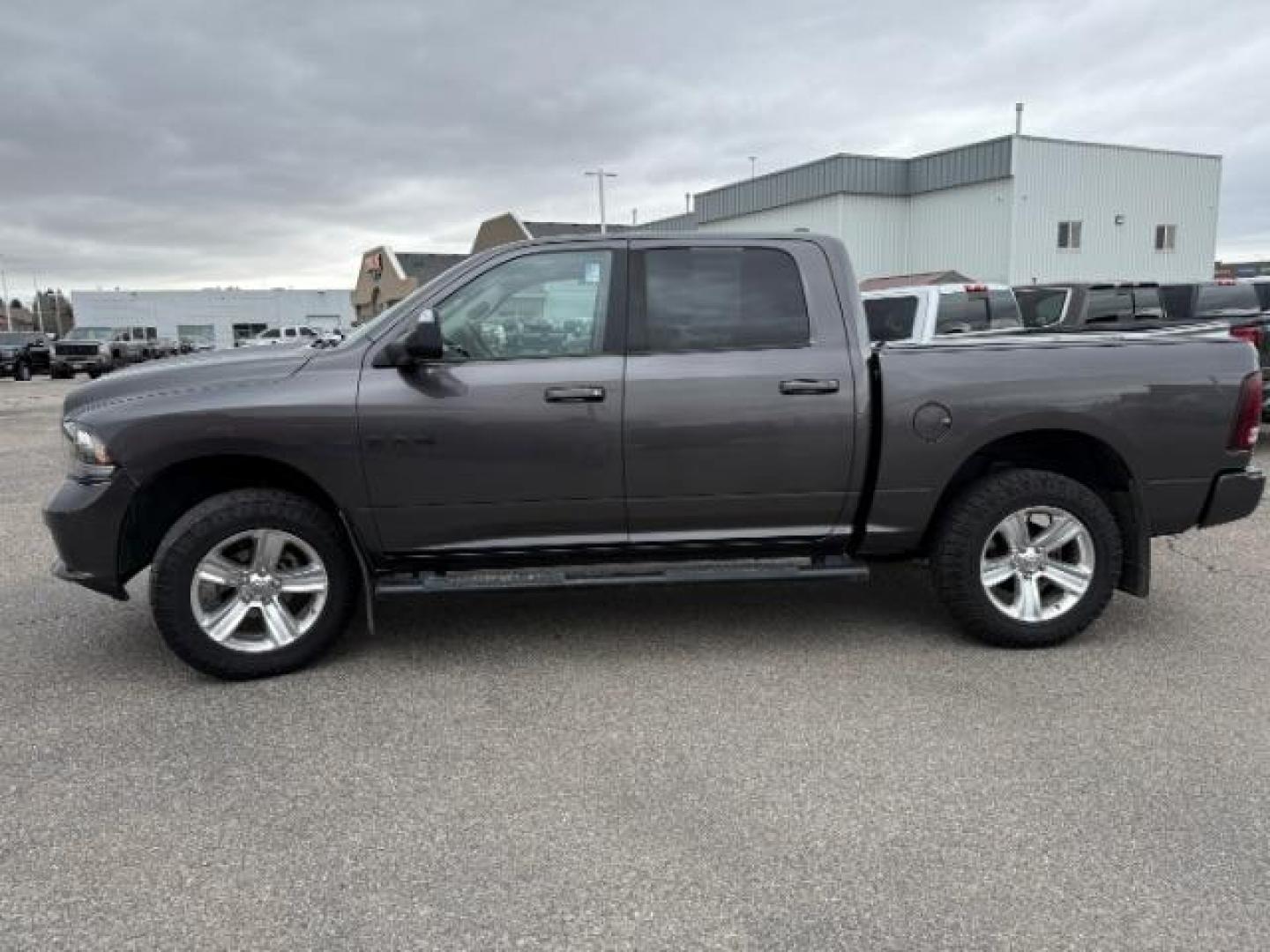 2015 BLACK /CLOTH RAM 1500 Sport Crew Cab SWB 4WD (1C6RR7MT5FS) with an 5.7L V8 OHV 16V engine, 8-Speed Automatic transmission, located at 1235 N Woodruff Ave., Idaho Falls, 83401, (208) 523-1053, 43.507172, -112.000488 - Photo#1