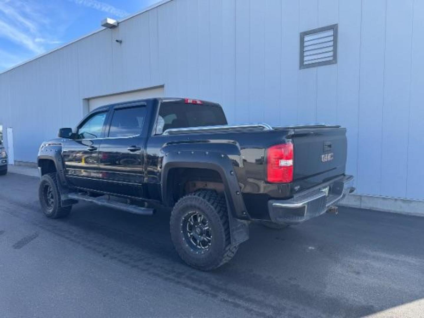 2014 BLACK /Jet Black GMC Sierra 1500 SLE Crew Cab 4WD (3GTU2UEC8EG) with an 5.3L V8 OHV 16V engine, 6-Speed Automatic transmission, located at 1235 N Woodruff Ave., Idaho Falls, 83401, (208) 523-1053, 43.507172, -112.000488 - Photo#2