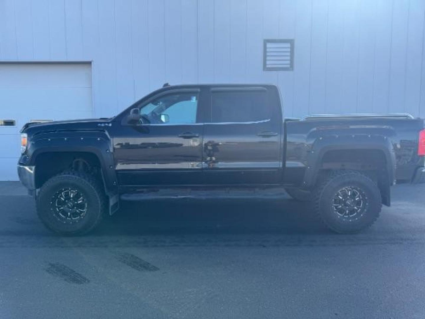 2014 BLACK /Jet Black GMC Sierra 1500 SLE Crew Cab 4WD (3GTU2UEC8EG) with an 5.3L V8 OHV 16V engine, 6-Speed Automatic transmission, located at 1235 N Woodruff Ave., Idaho Falls, 83401, (208) 523-1053, 43.507172, -112.000488 - Photo#1