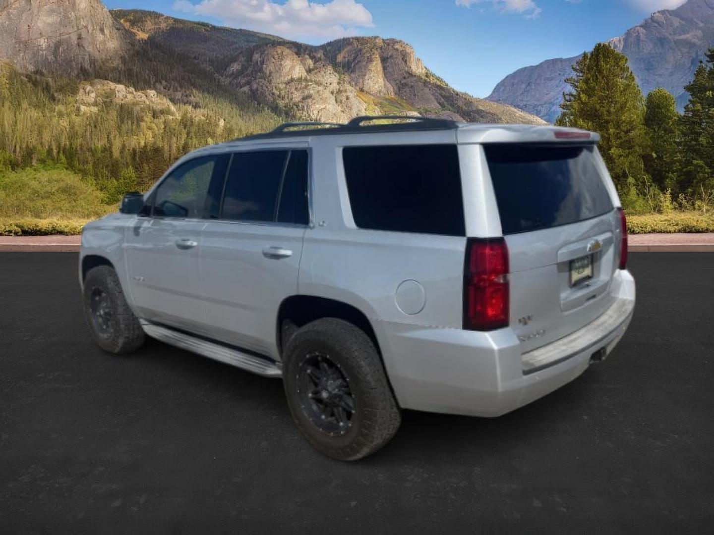 2015 SILVER /LEATHER Chevrolet Tahoe LT 4WD (1GNSKBKCXFR) with an 5.3L V8 OHV 16V engine, 6-Speed Automatic transmission, located at 1235 N Woodruff Ave., Idaho Falls, 83401, (208) 523-1053, 43.507172, -112.000488 - Photo#2