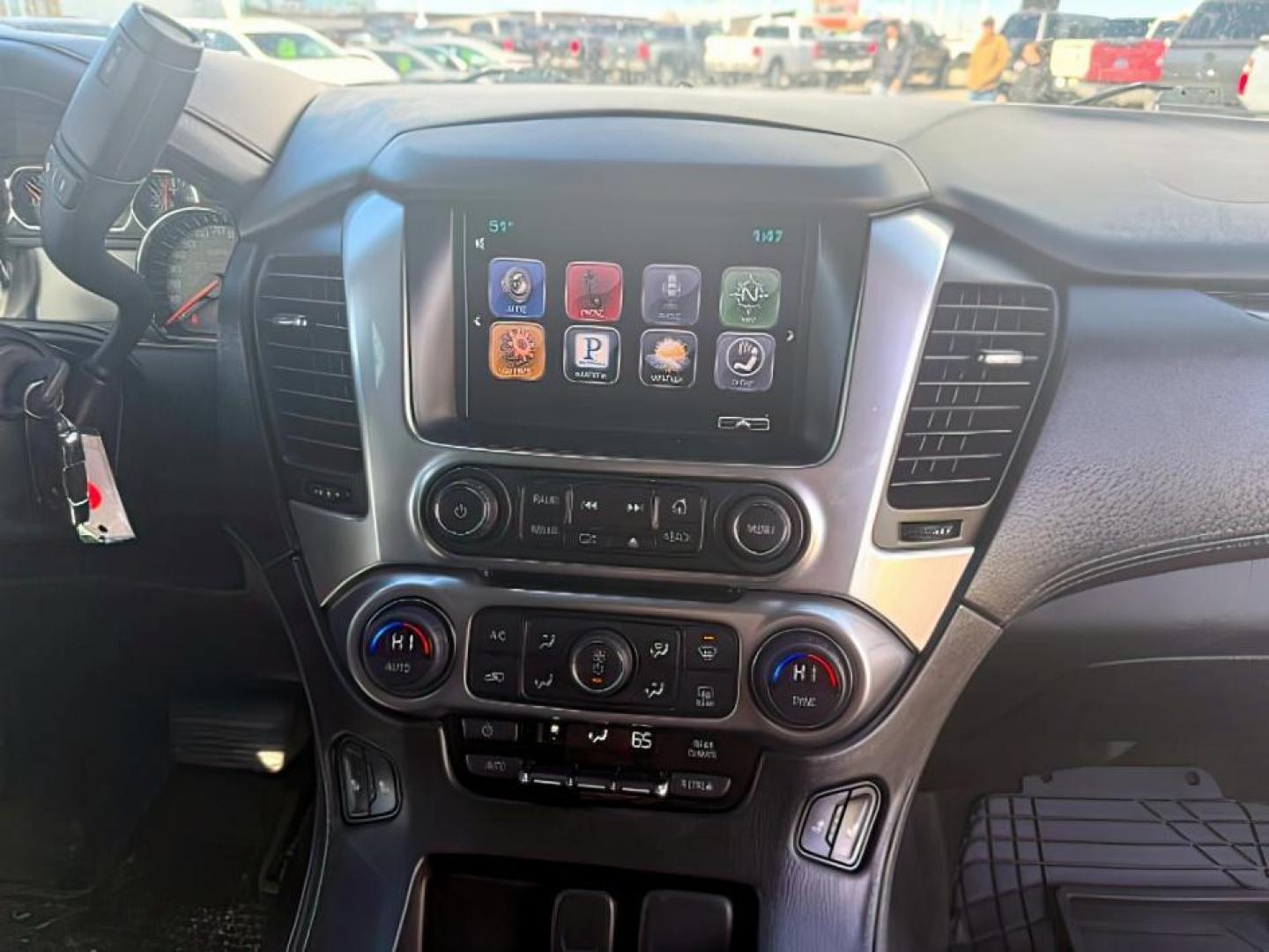 2015 SILVER /LEATHER Chevrolet Tahoe LT 4WD (1GNSKBKCXFR) with an 5.3L V8 OHV 16V engine, 6-Speed Automatic transmission, located at 1235 N Woodruff Ave., Idaho Falls, 83401, (208) 523-1053, 43.507172, -112.000488 - Photo#14