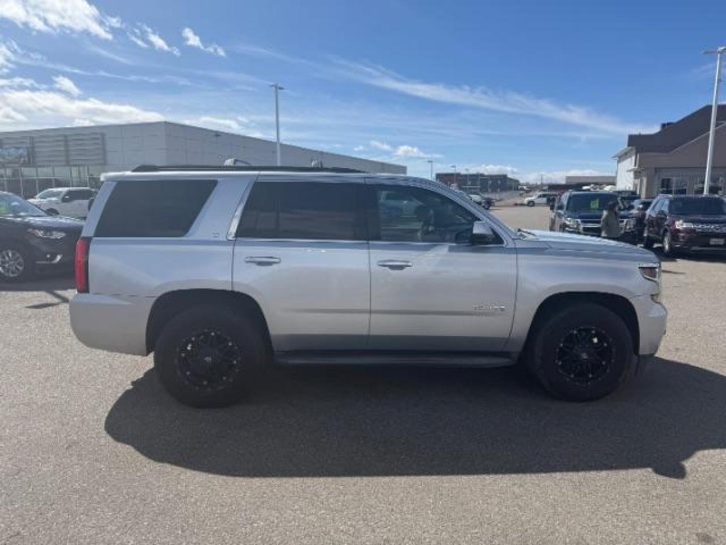 2015 SILVER /LEATHER Chevrolet Tahoe LT 4WD (1GNSKBKCXFR) with an 5.3L V8 OHV 16V engine, 6-Speed Automatic transmission, located at 1235 N Woodruff Ave., Idaho Falls, 83401, (208) 523-1053, 43.507172, -112.000488 - Photo#5
